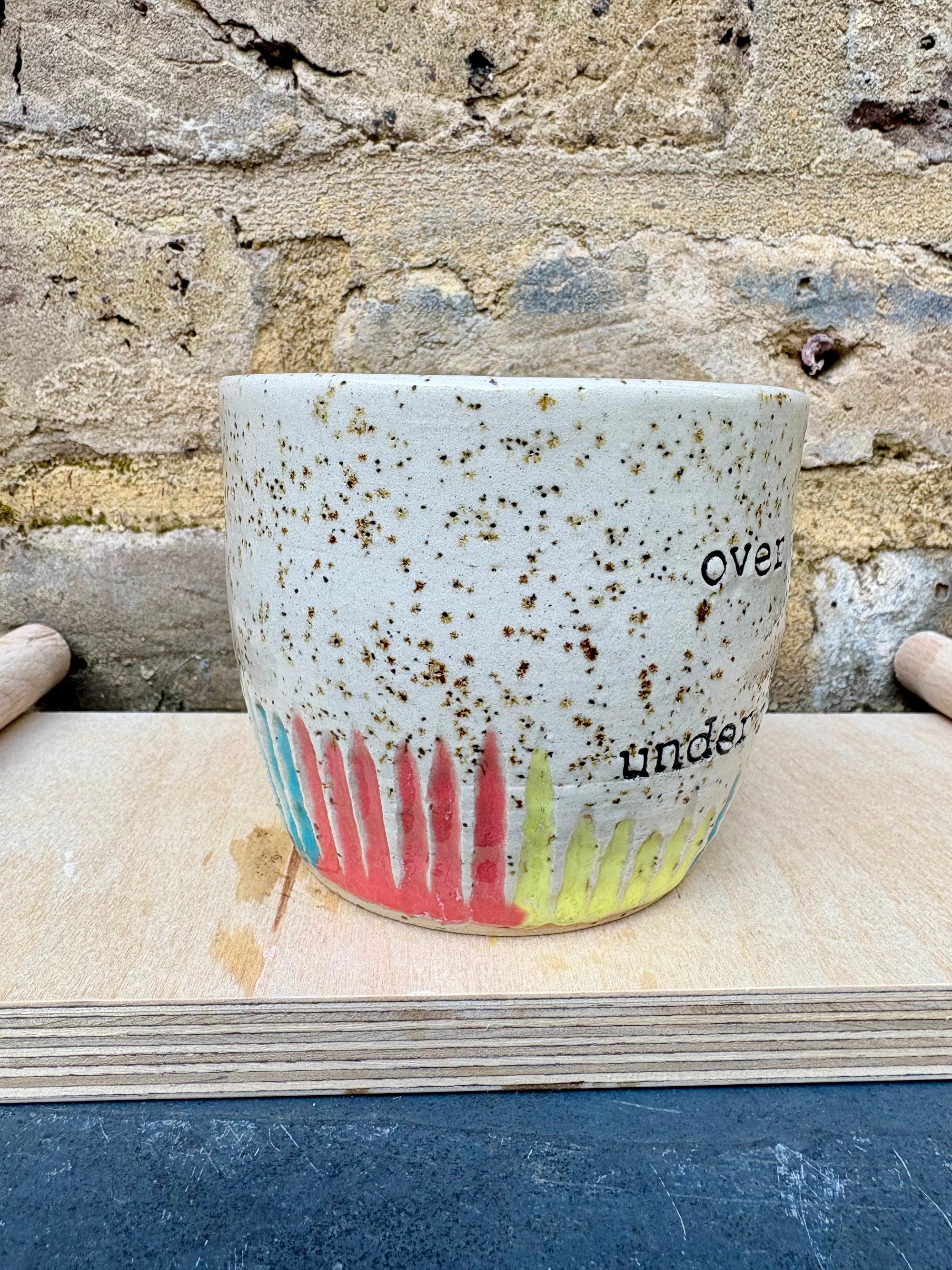 overworked and underfucked mug (multicoloured rainbow grooves)