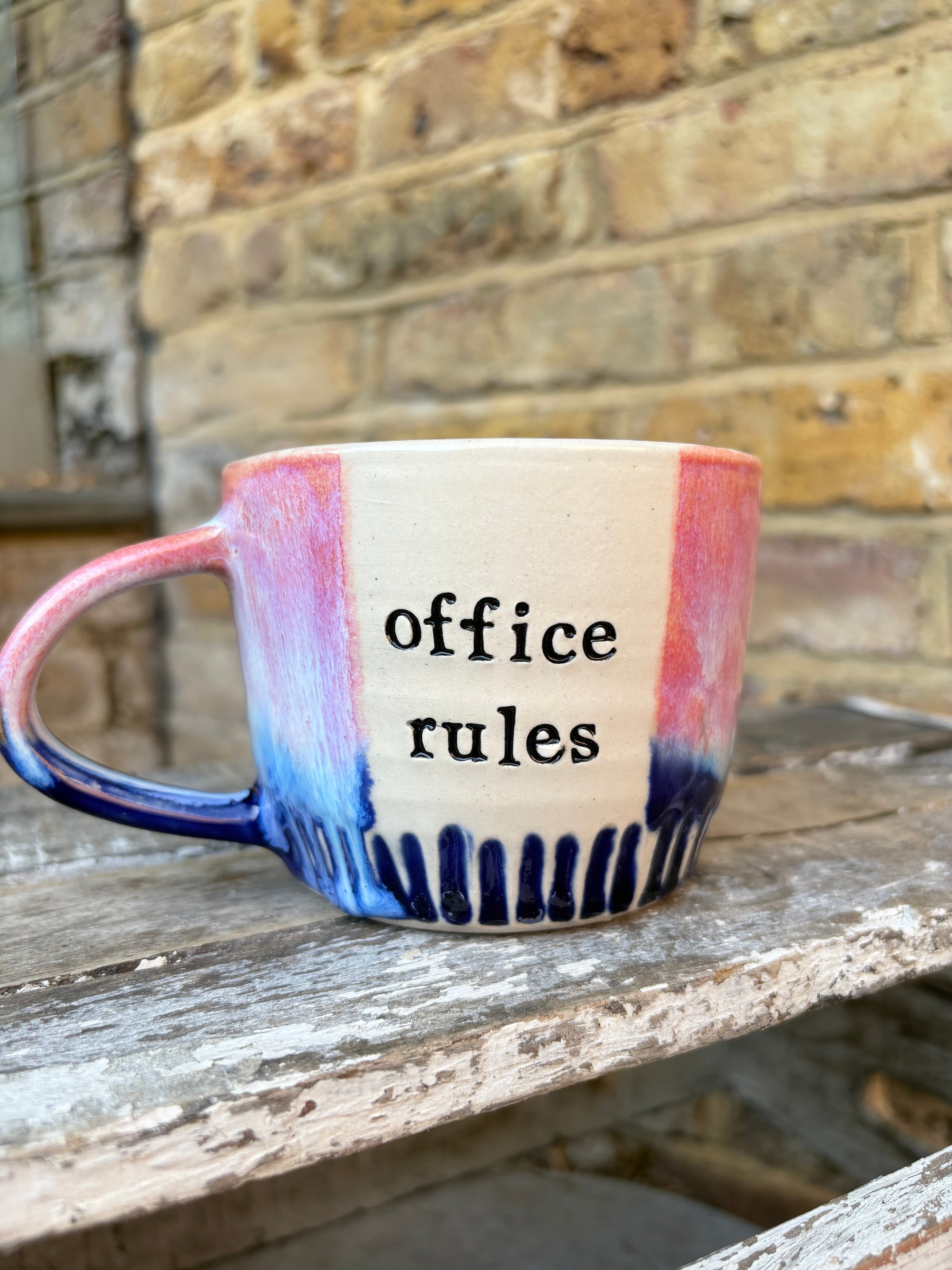 "office rules” "no whistling no humming no sniffing no chewing no toes (men)" mug (pink/blue, 300ml)