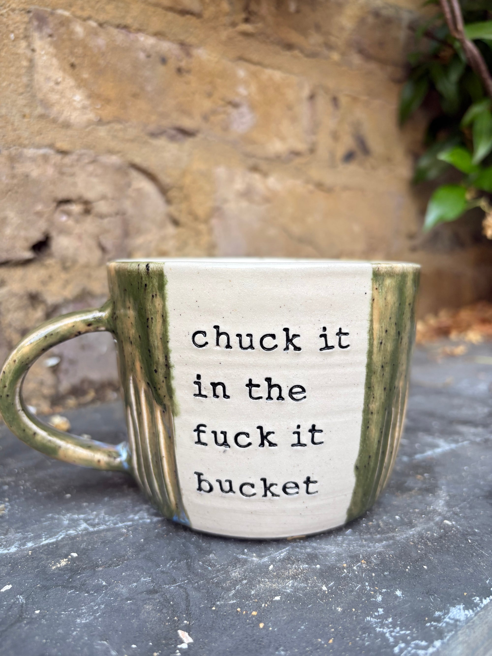 “chuck it in the fuck it bucket" mug (green speckle, 380ml)