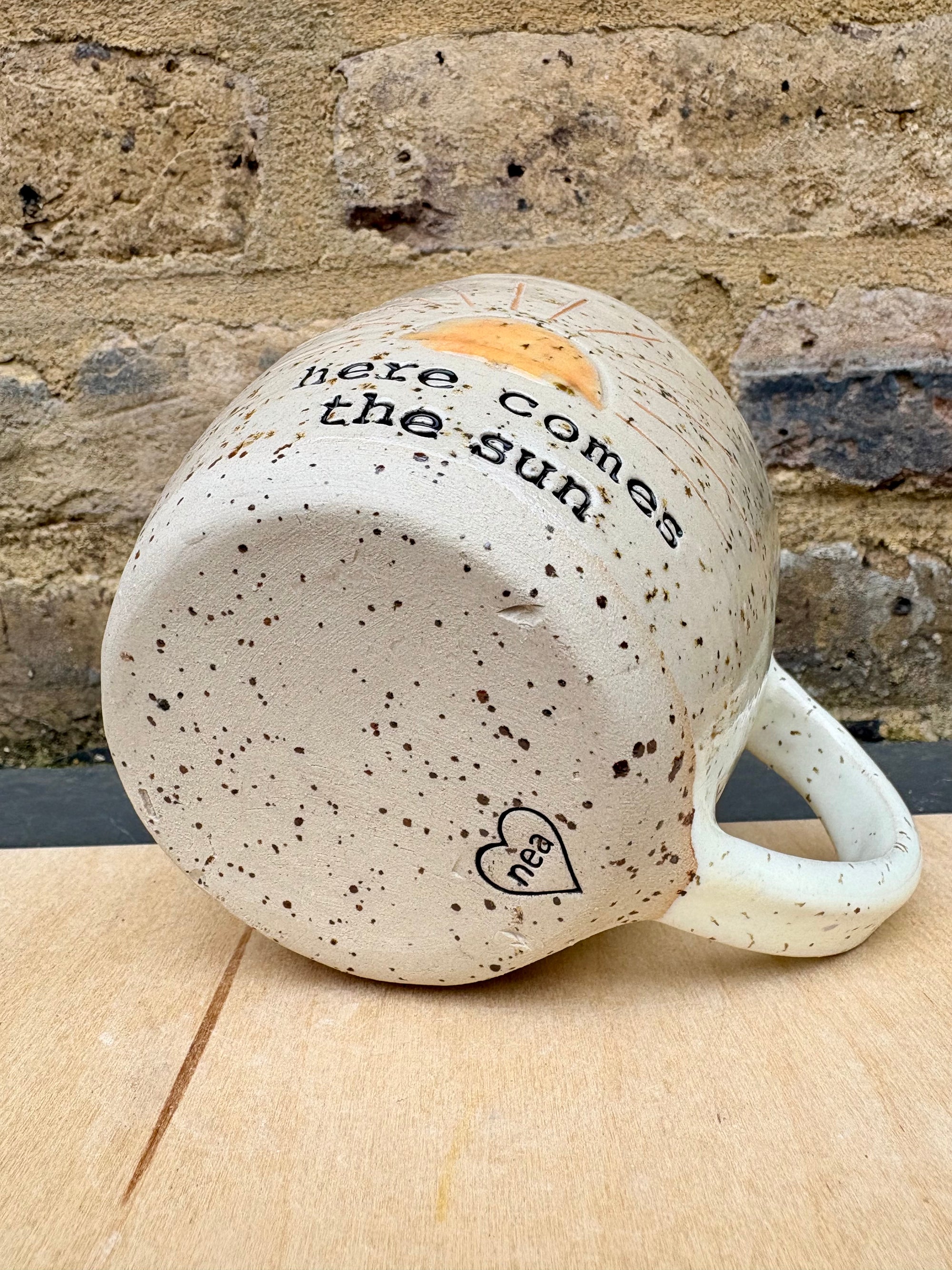 "here comes the sun" mug (orange sun)