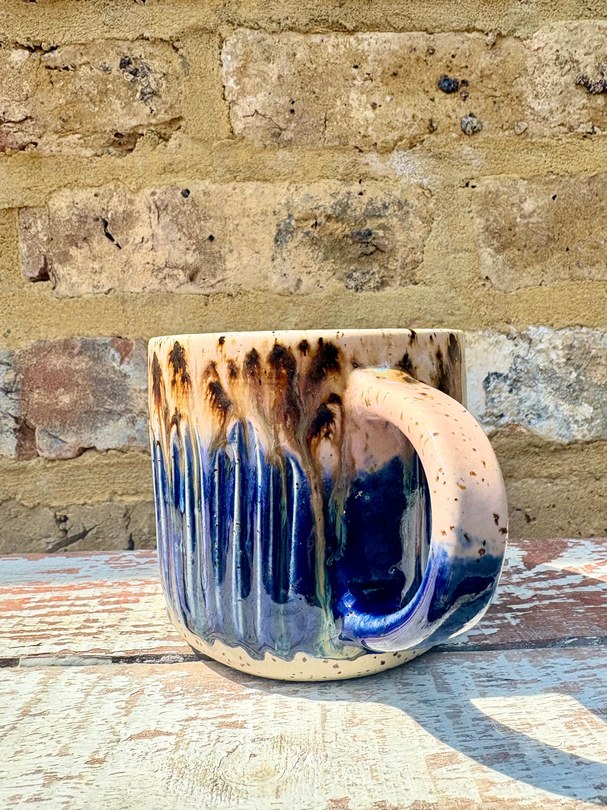 "happy to be here” "what a bunch of cunts" mug (pink/blue, grooves)