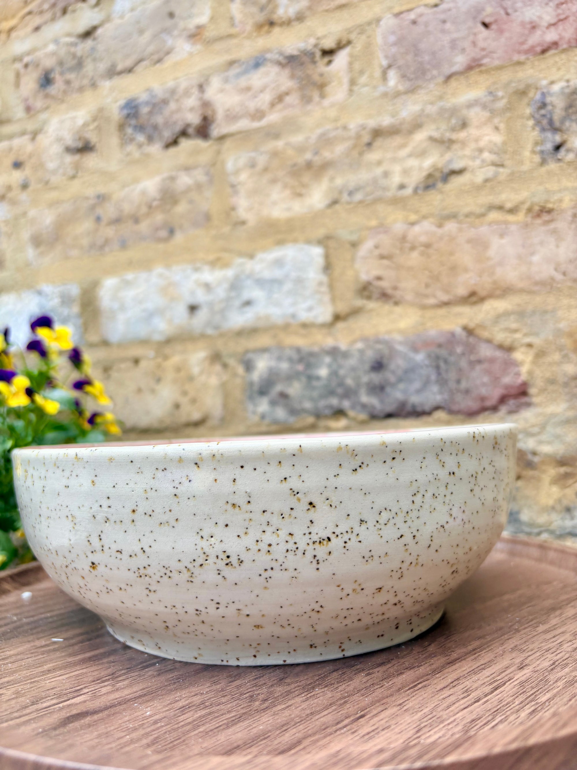 “eat, drink and fuck off by 9pm"  deep round salad/pasta bowl (pink, flecked clay)