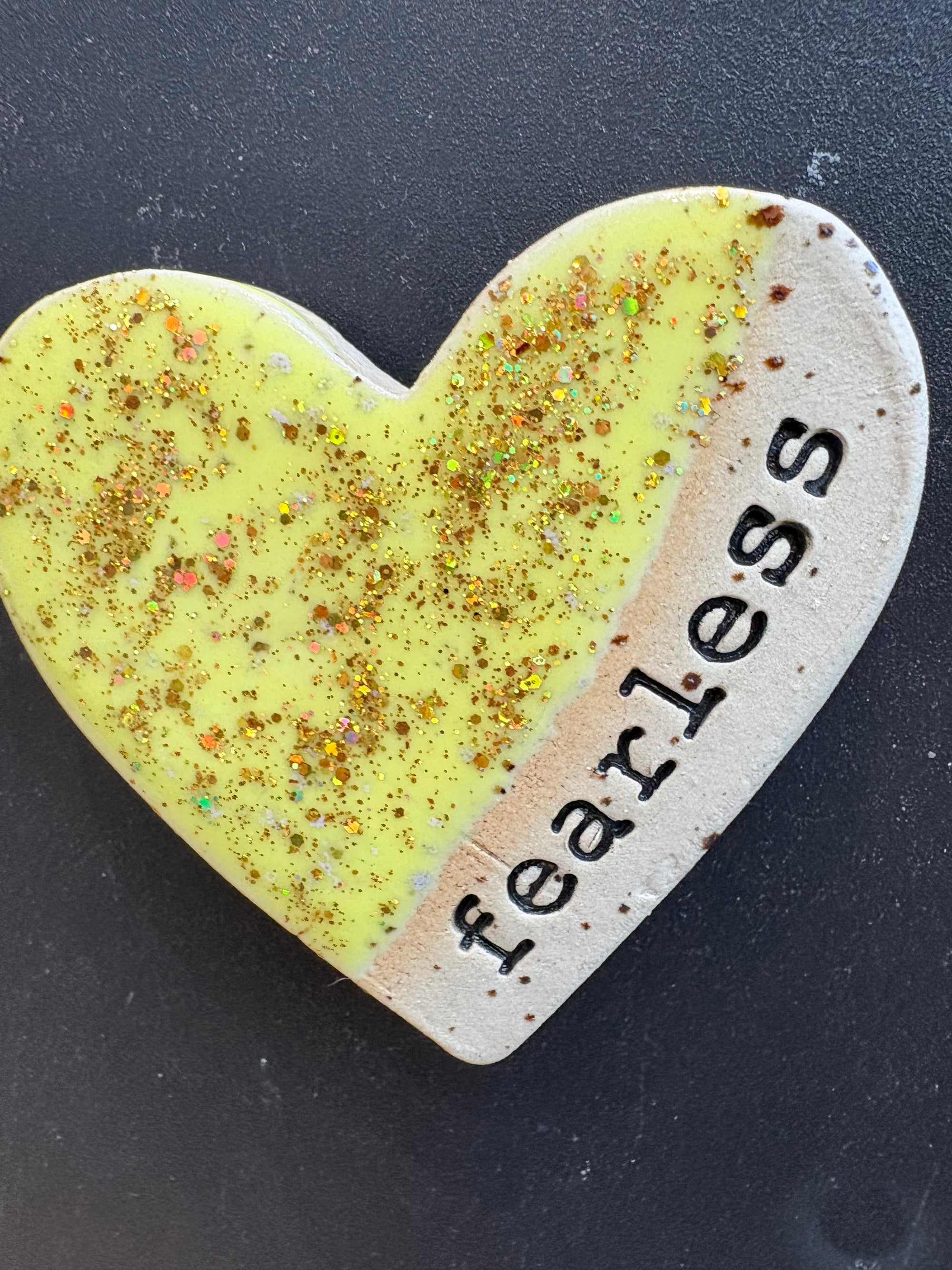 Twelve heart shaped Taylor Swift album magnets