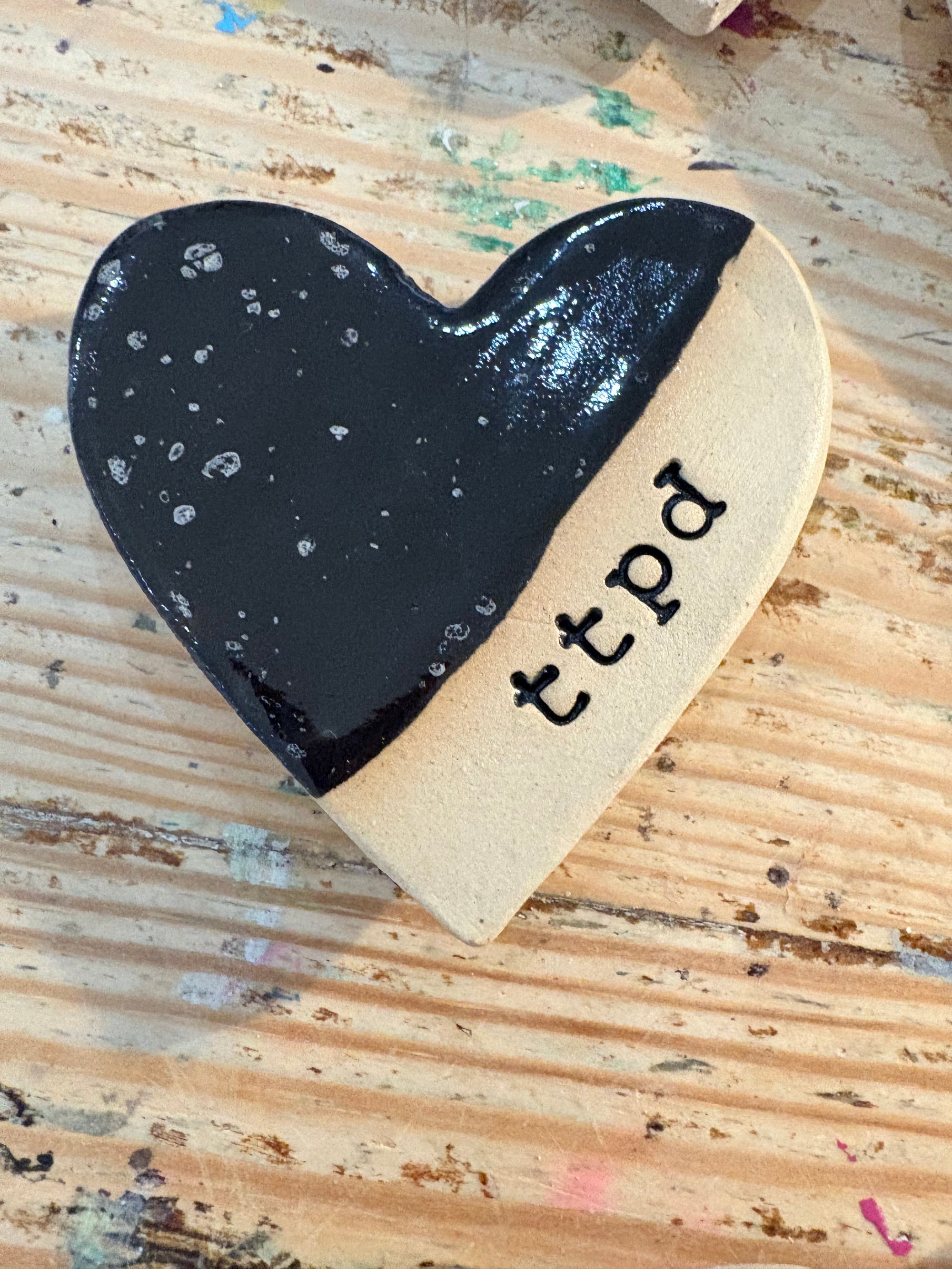 Twelve heart shaped Taylor Swift album magnets