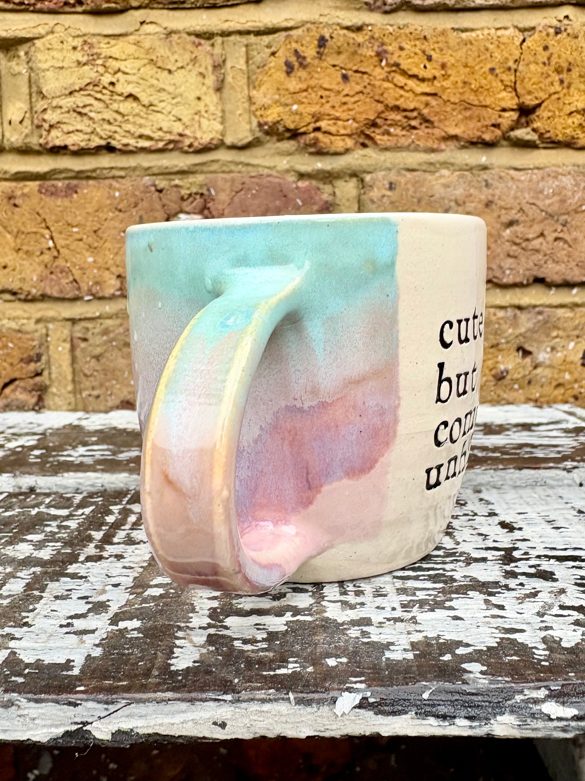 "cute but completely unhinged" mug