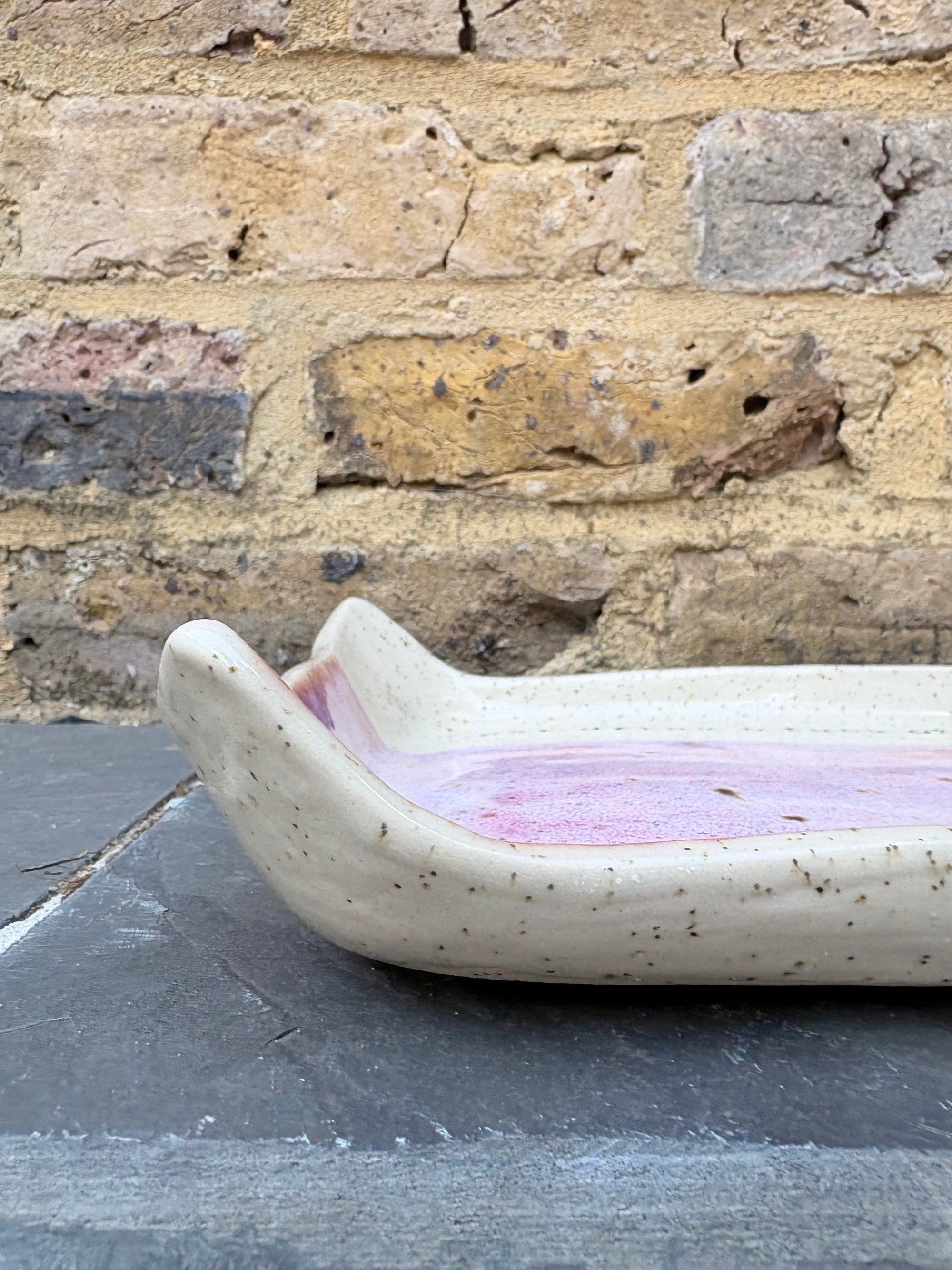 “eat, drink and fuck off by 9pm" rectangular dish (pink, flecked clay)
