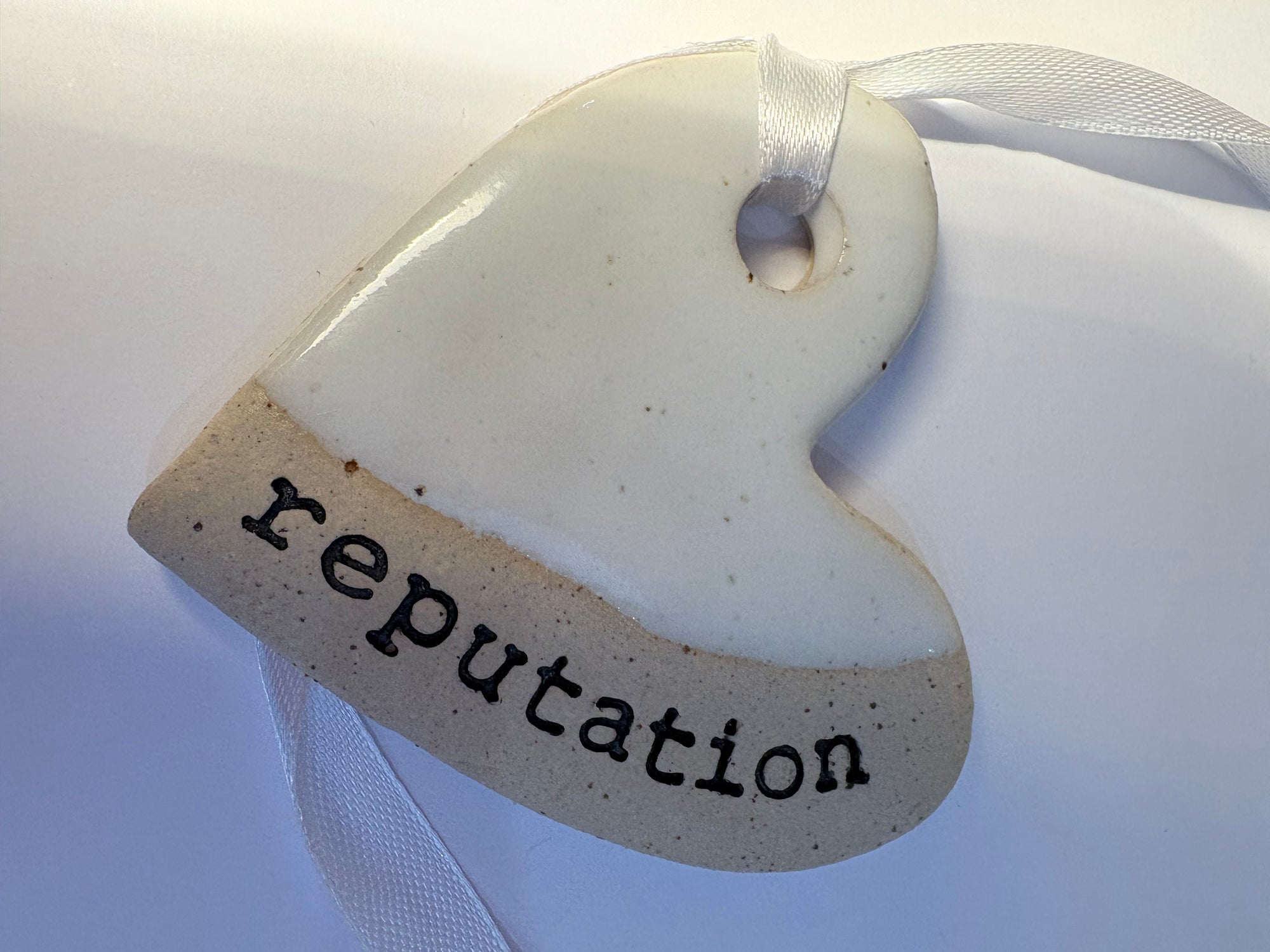 “reputation" hanging decoration