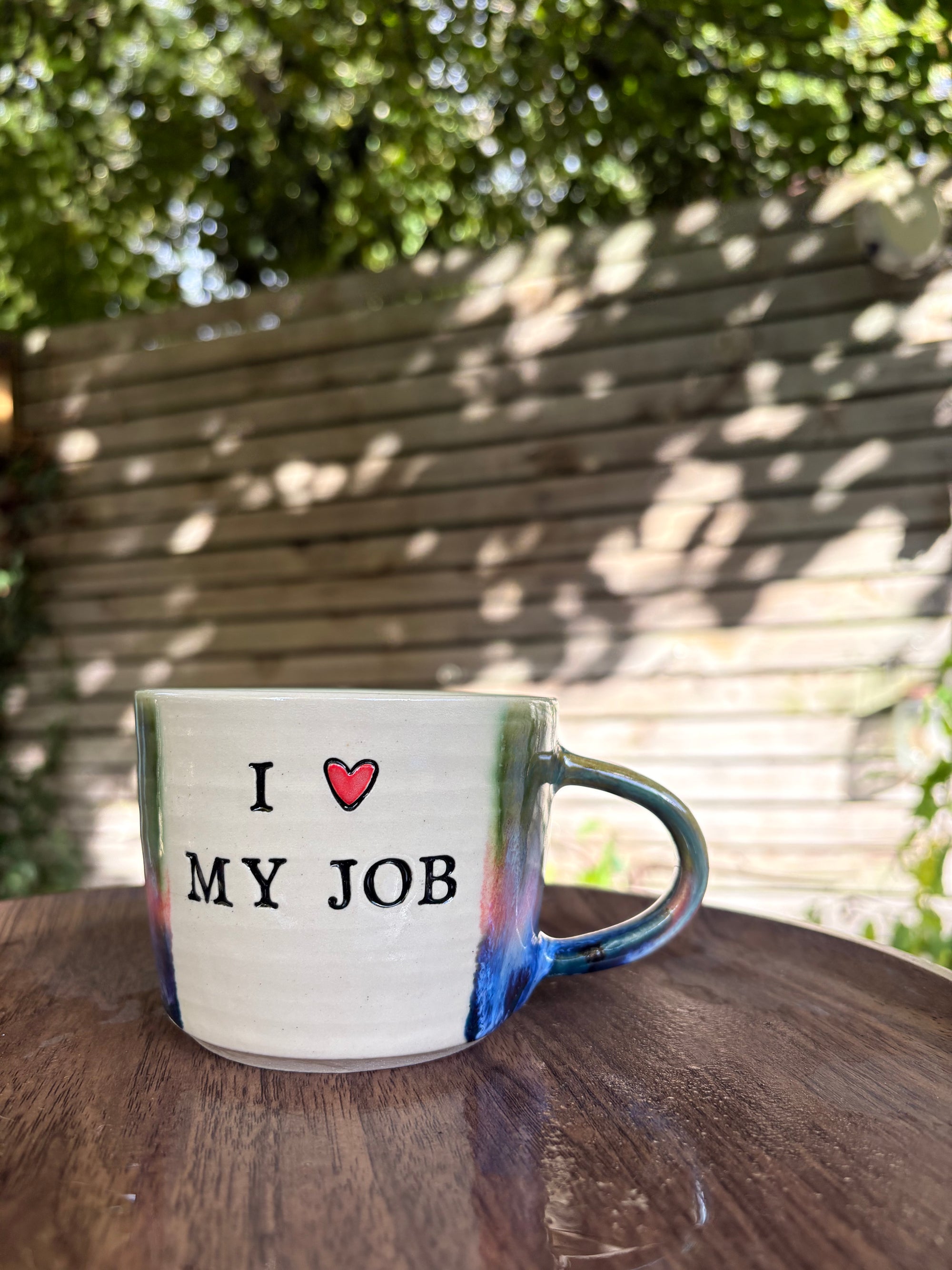 "I 🩷 my job” "FML" mug (green/pink/blue, left hander)