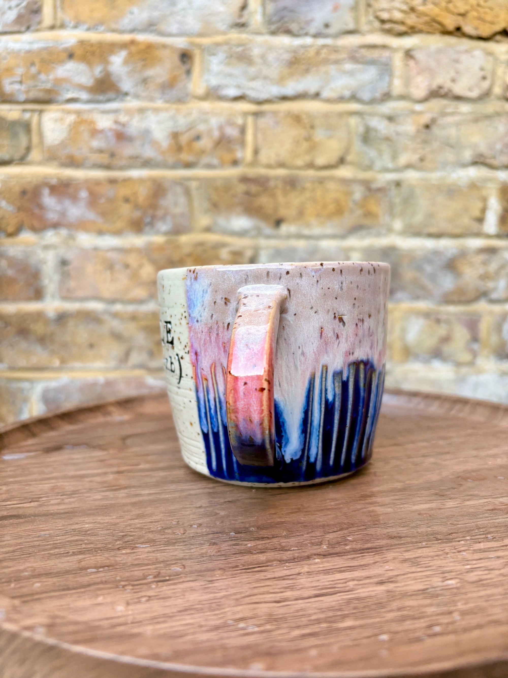 “FRAGILE (like a bomb) mug (blue/pink/black text)