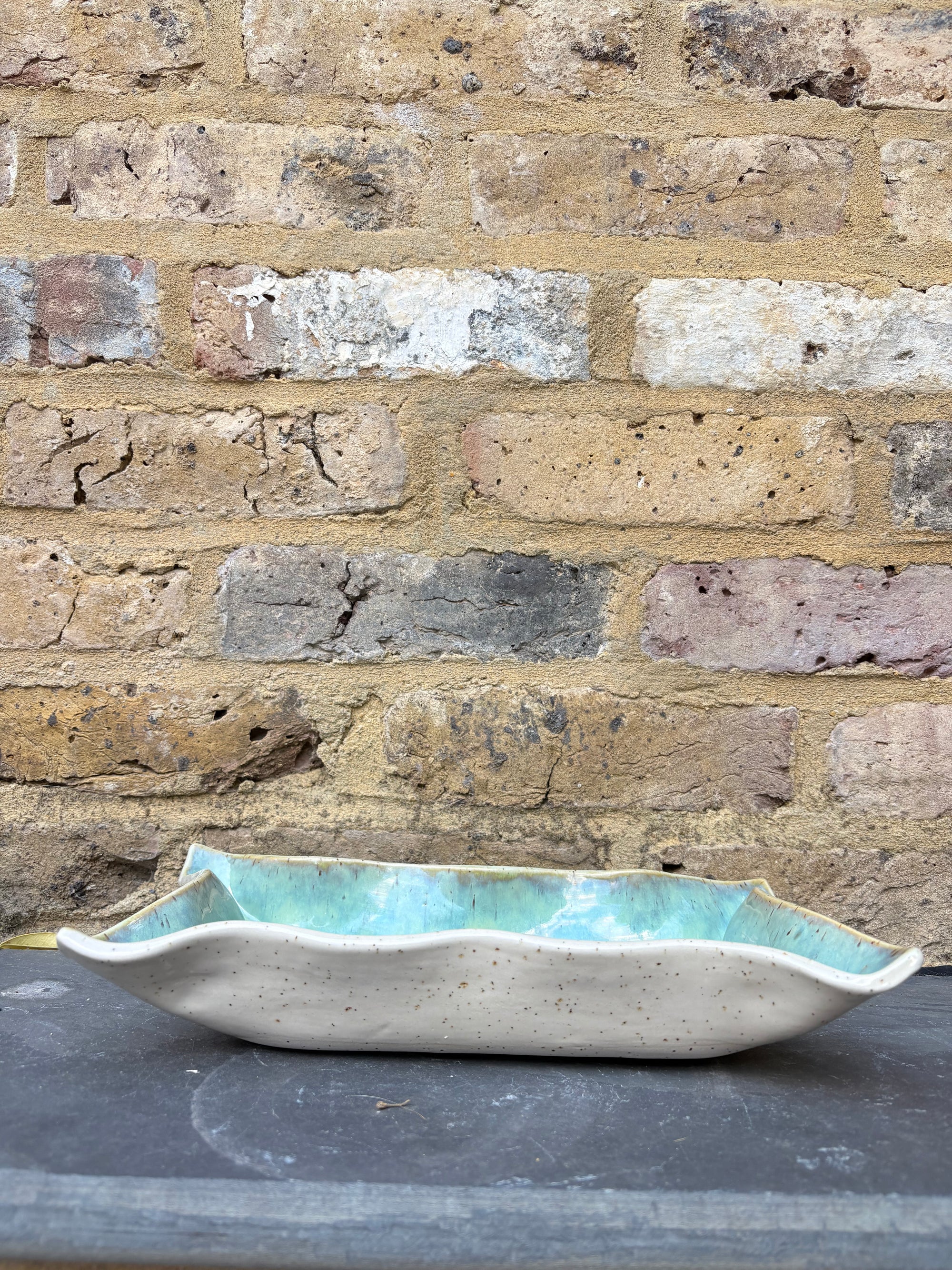 “eat, drink and fuck off by 9pm" rectangular dish (green, flecked clay)