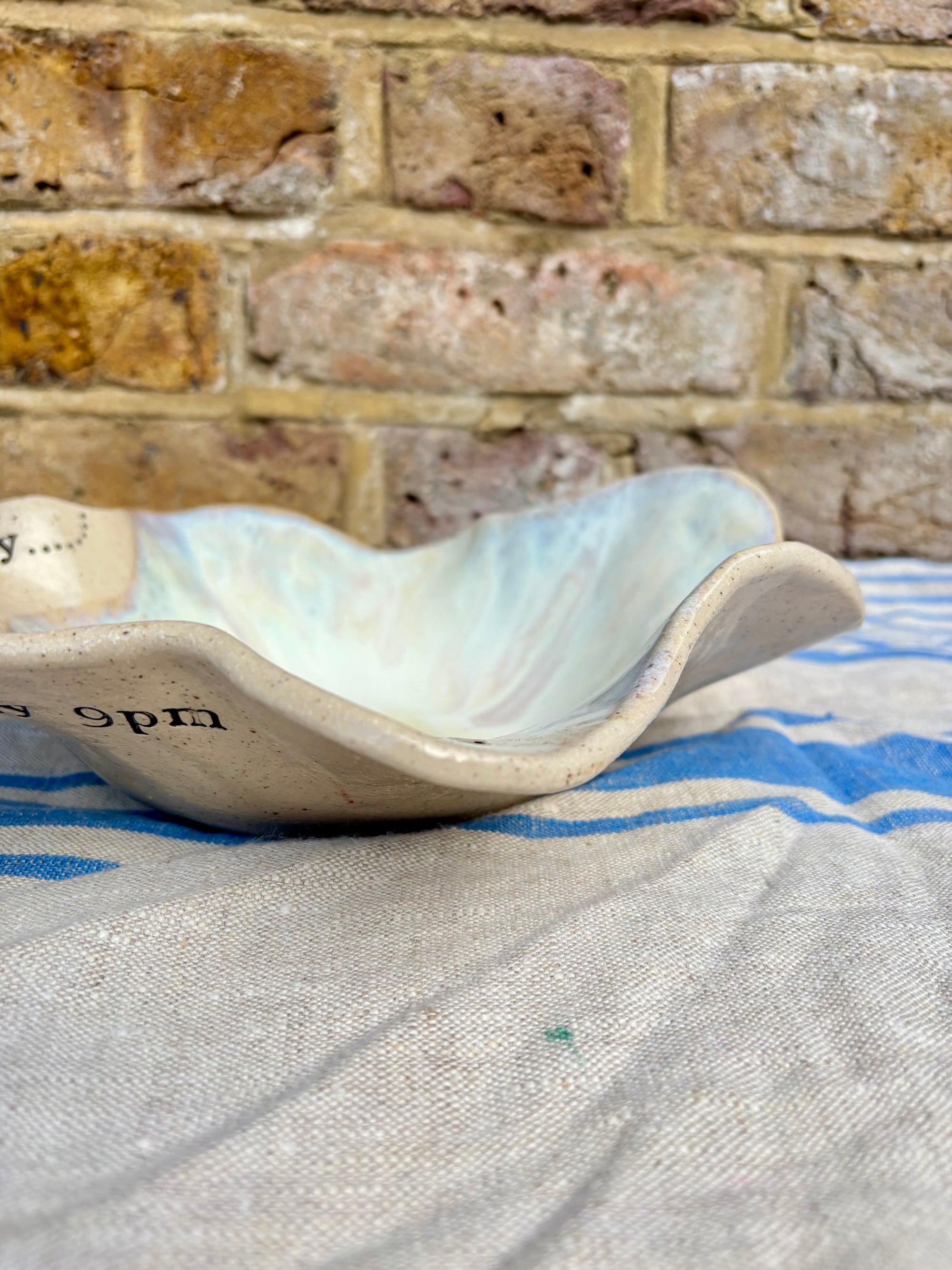 "good food, fine wine, great company..." serving dish