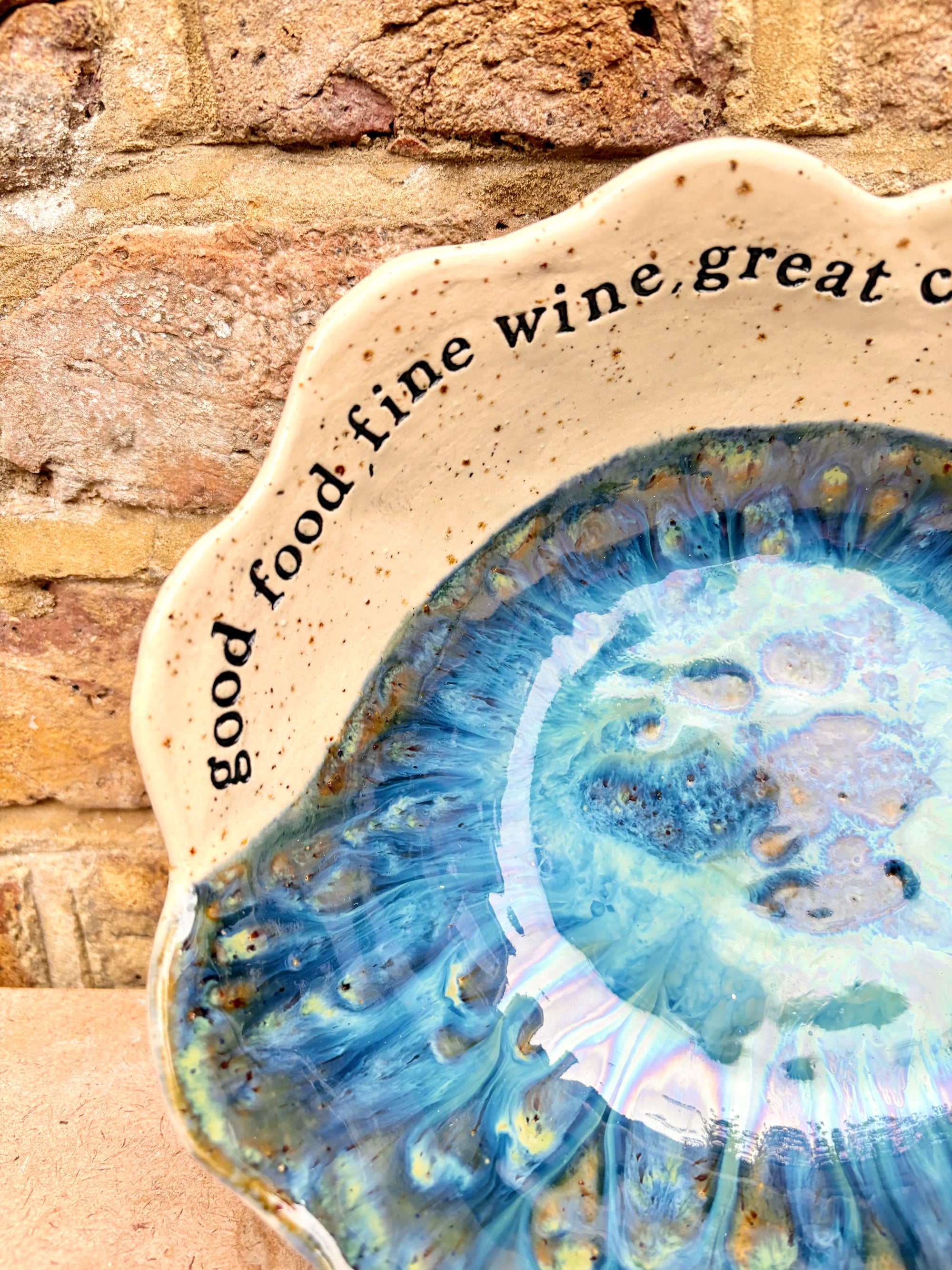 "good food, fine wine, great company..." deep salad/serving dish