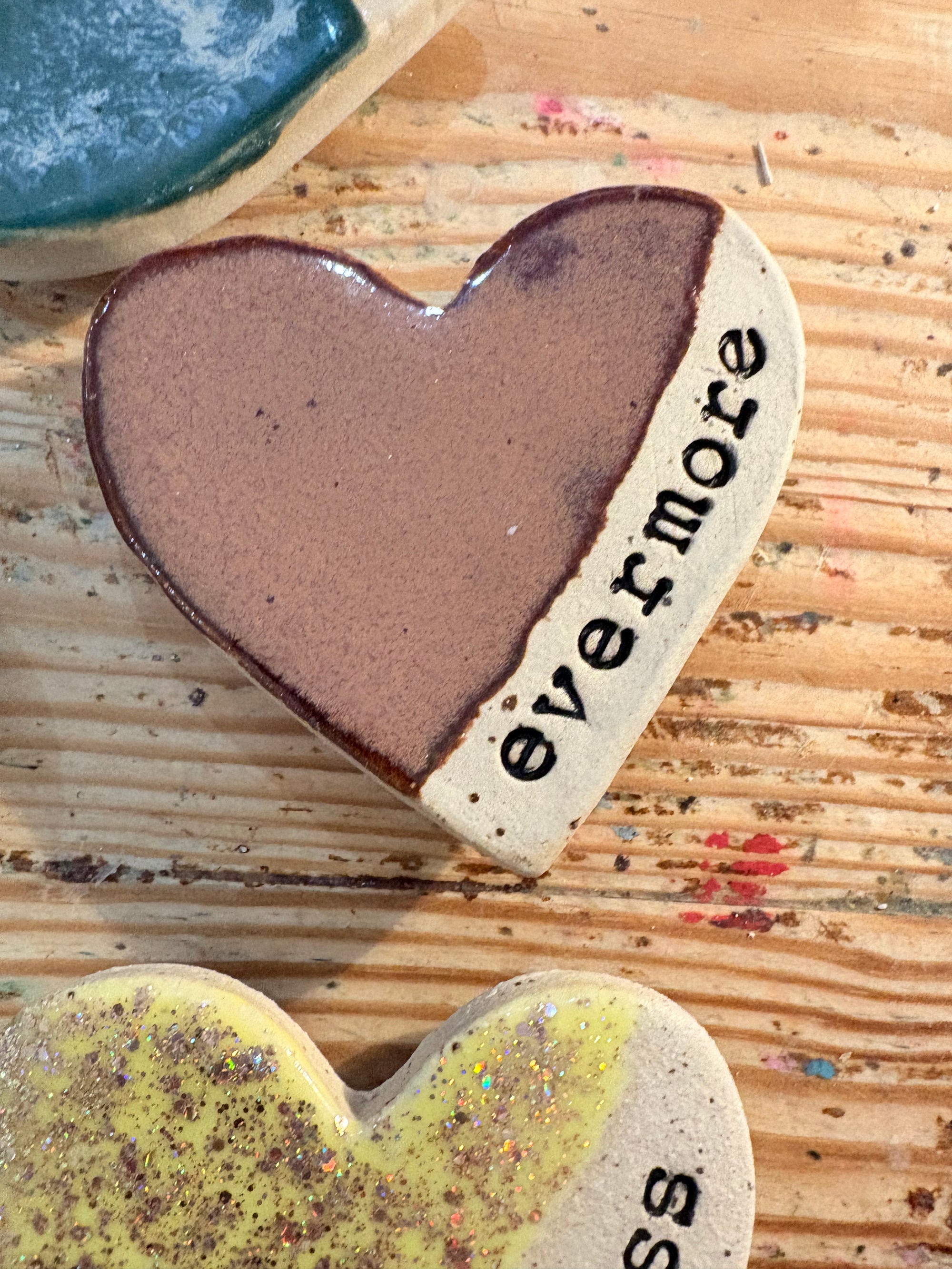 Twelve heart shaped Taylor Swift album magnets