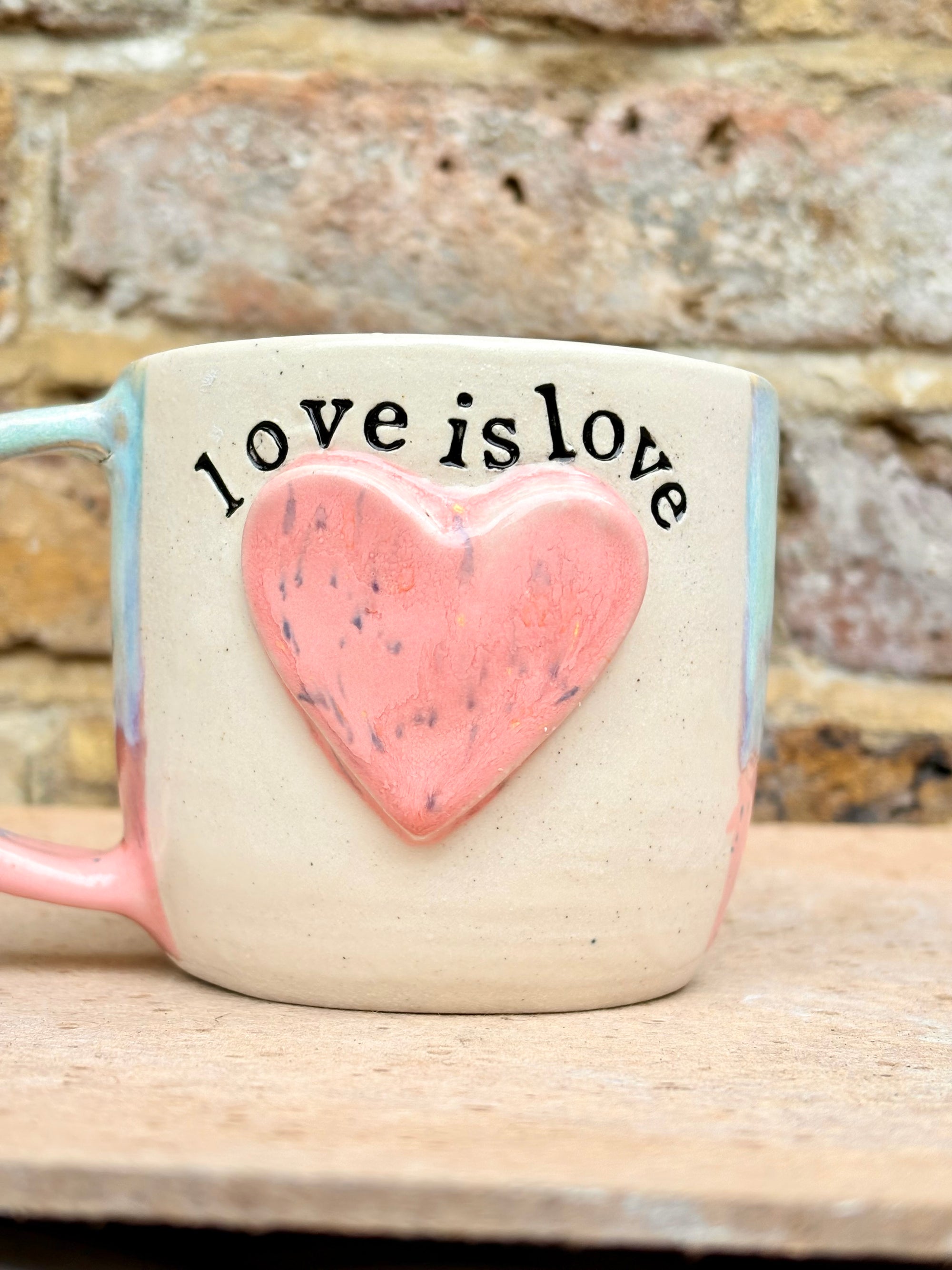 “love is love” mug (pink heart)