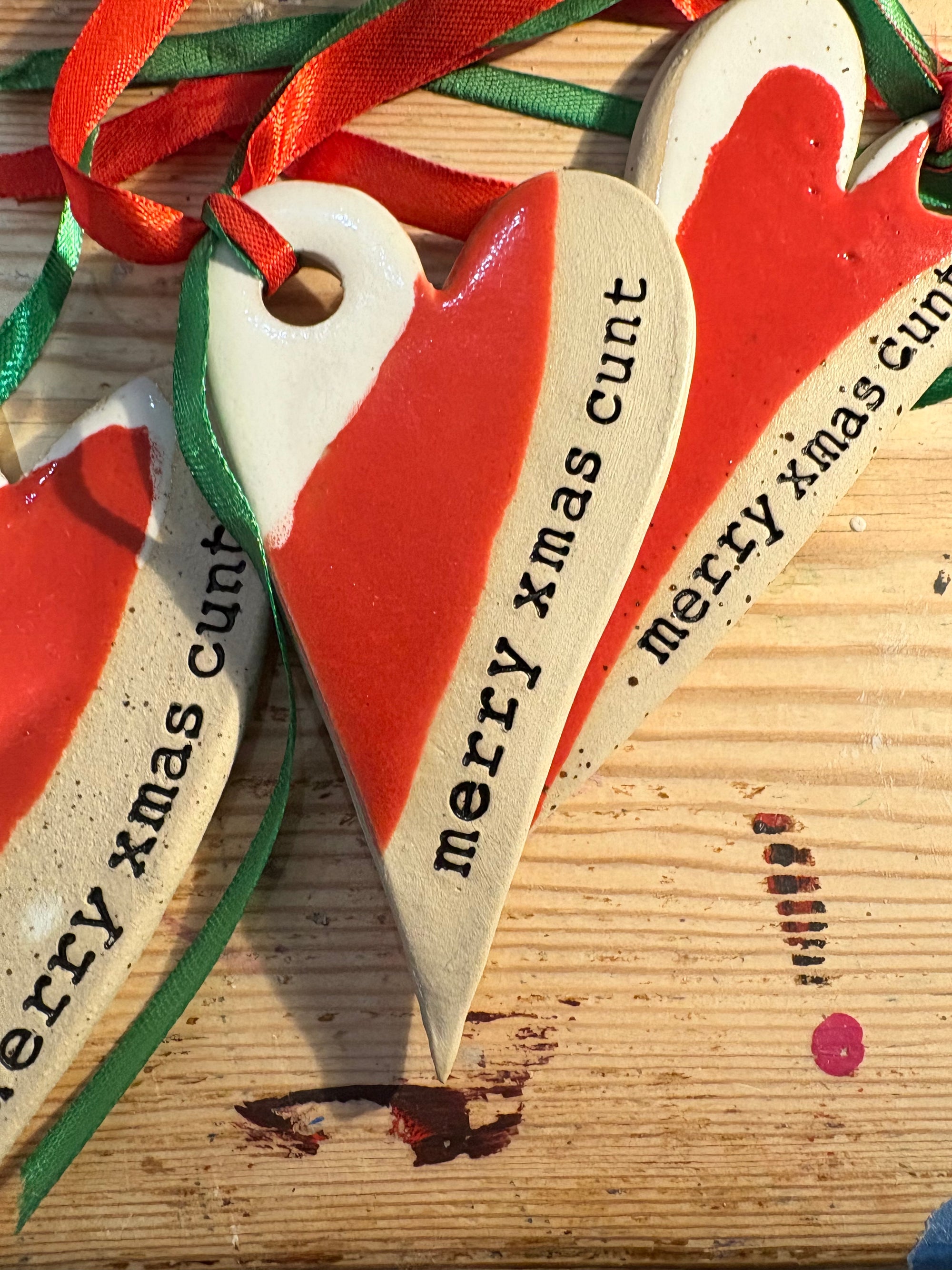 “merry xmas cunt” hanging decoration (red and white, large)