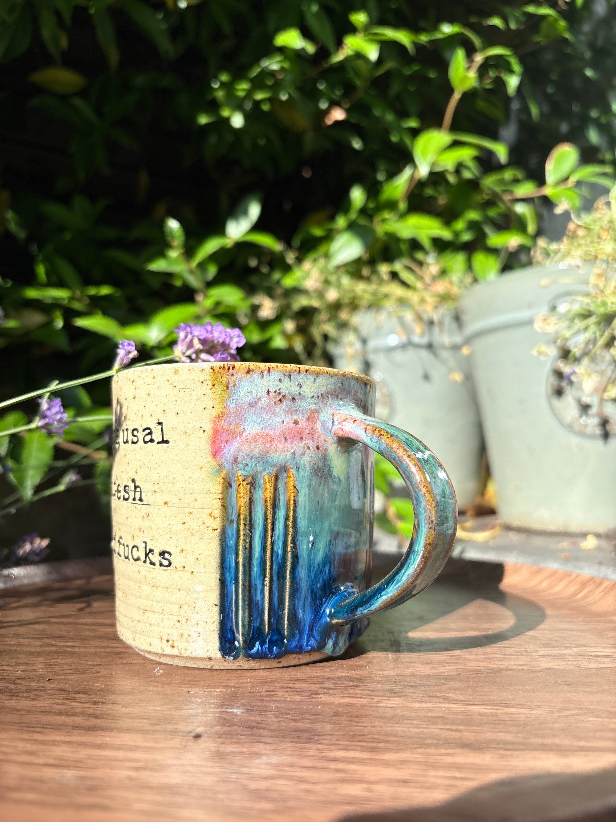 "menopausal and fresh out of fucks" mug (green/blue)