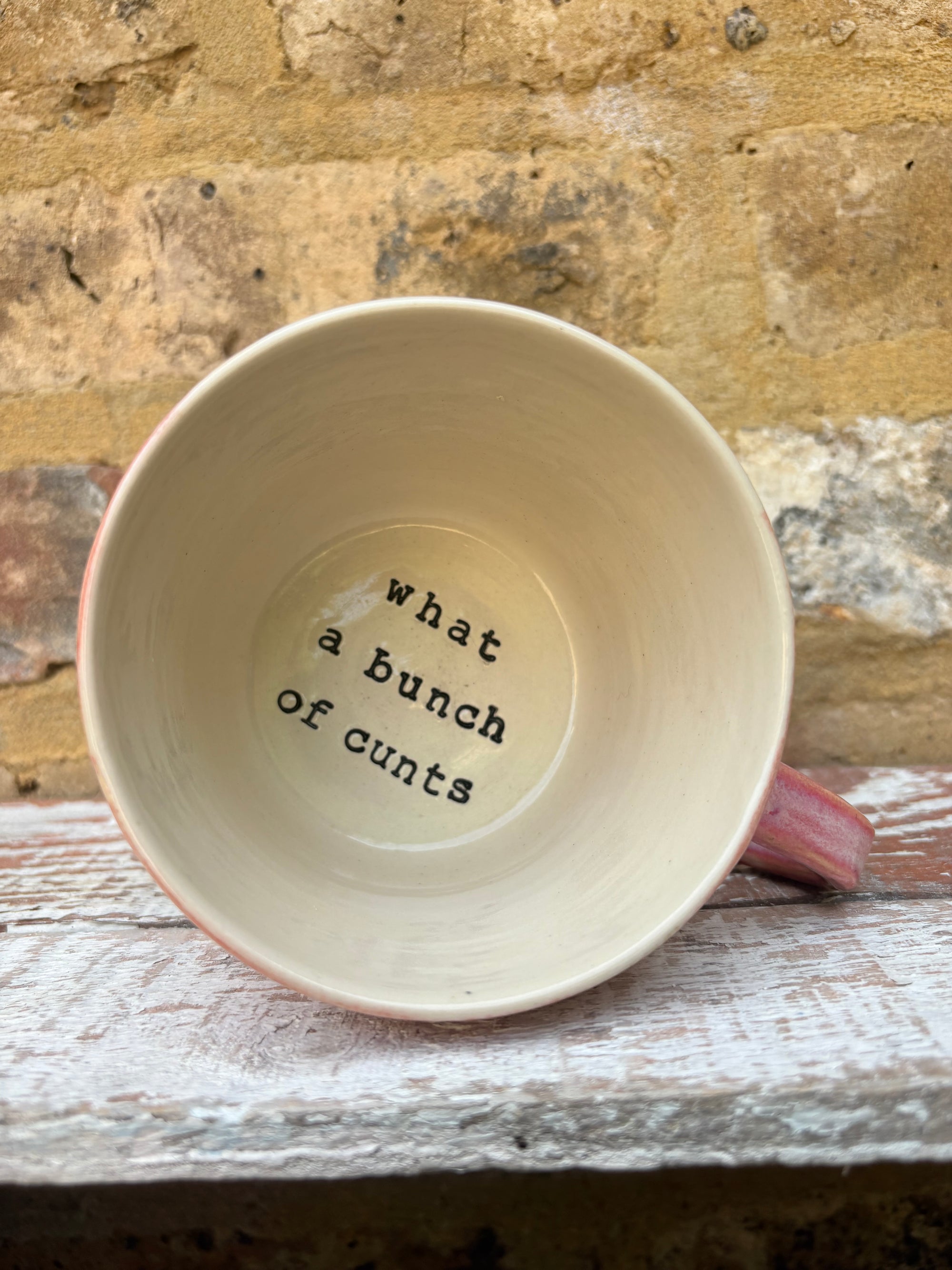 "really happy to be here” "what a bunch of cunts" mug (pink/lilac)