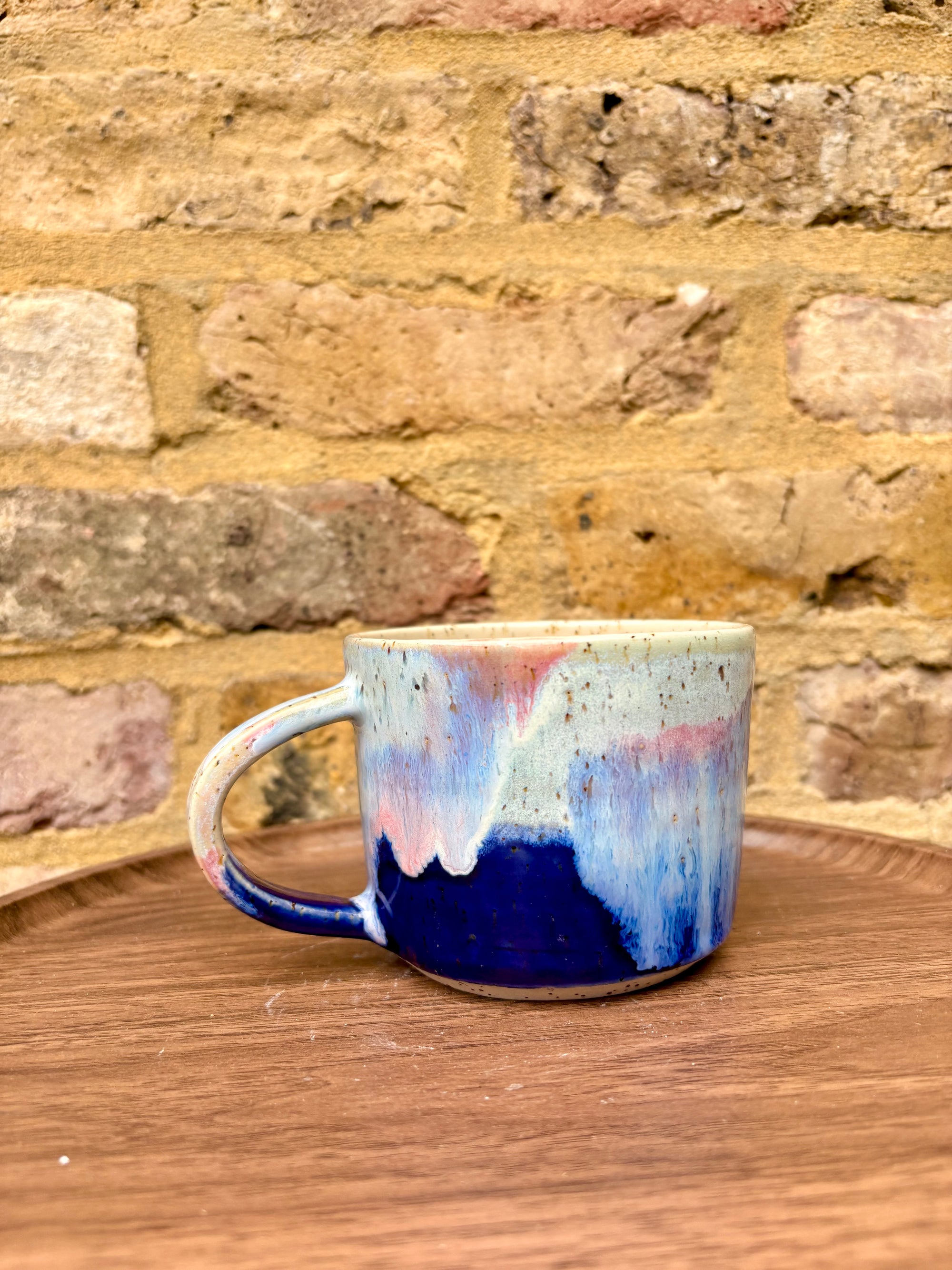 “woke up sexy as hell again” mug (flecked, pink night sky)