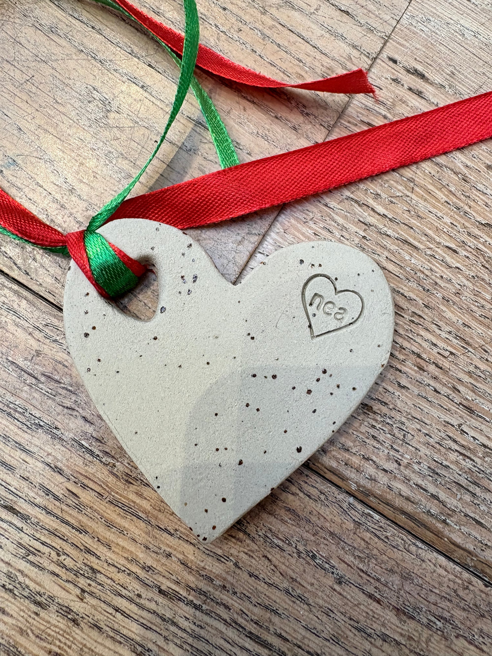 “merry fuckmas” hanging decoration (red and white, large)