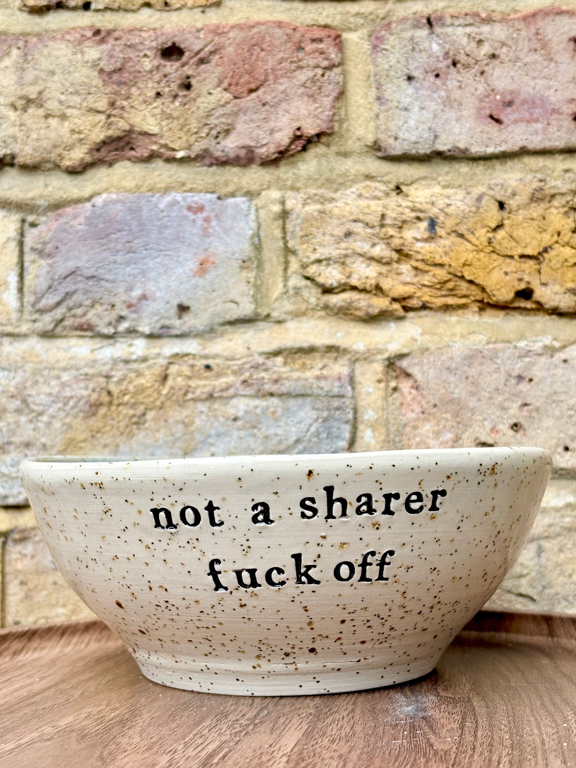 “not a sharer fuck off” deep round cereal bowl (blue, flecked clay)