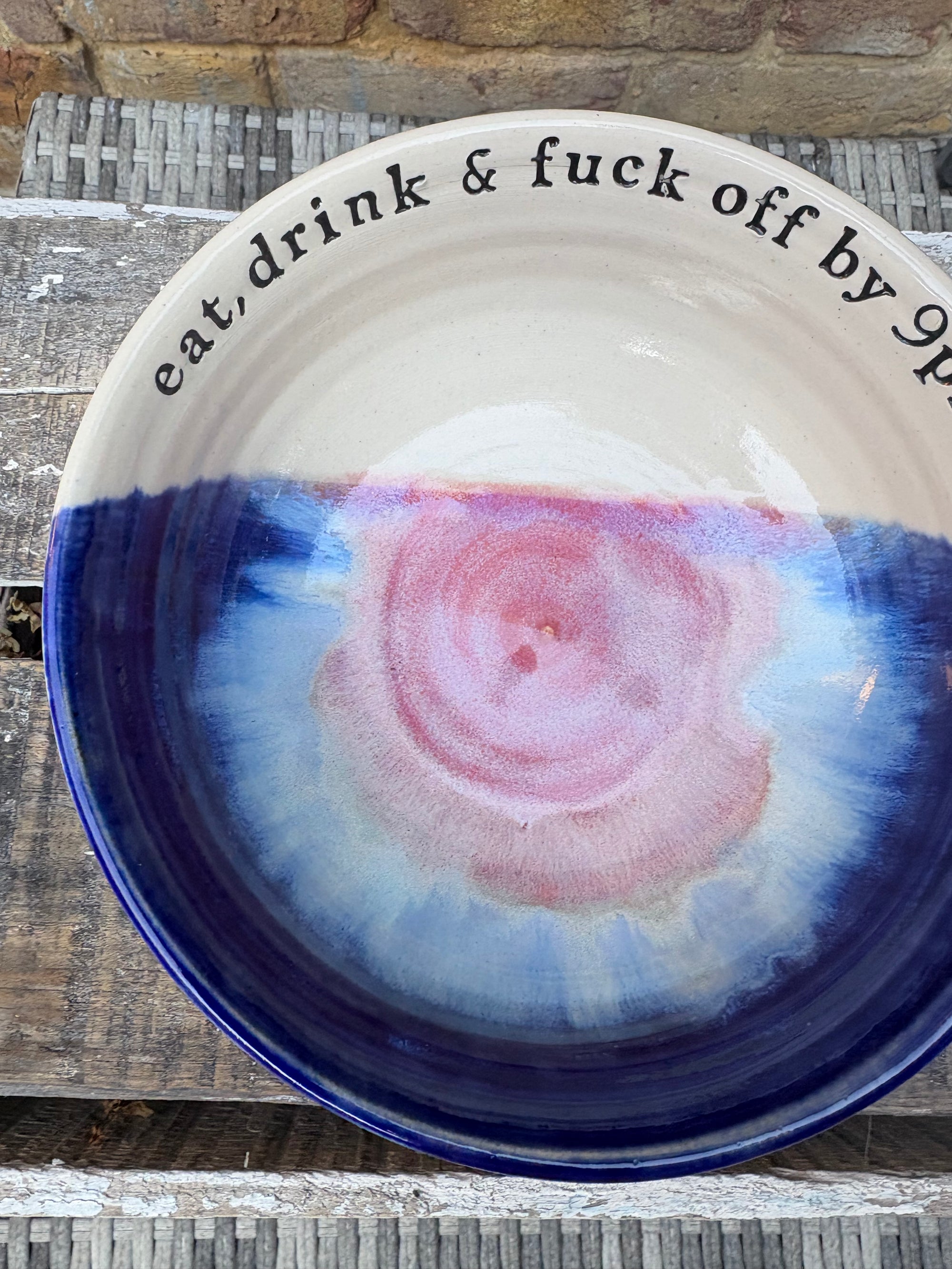 “eat, drink and fuck off by 9pm"  deep round salad/pasta bowl (pink night sky)