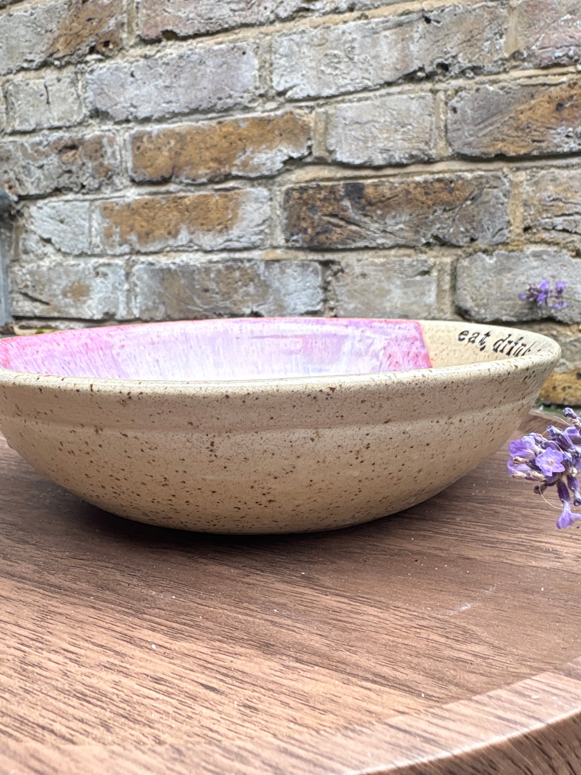 “eat, drink and fuck off by 9pm"  deep round salad/pasta bowl (pink, dark flecked clay)