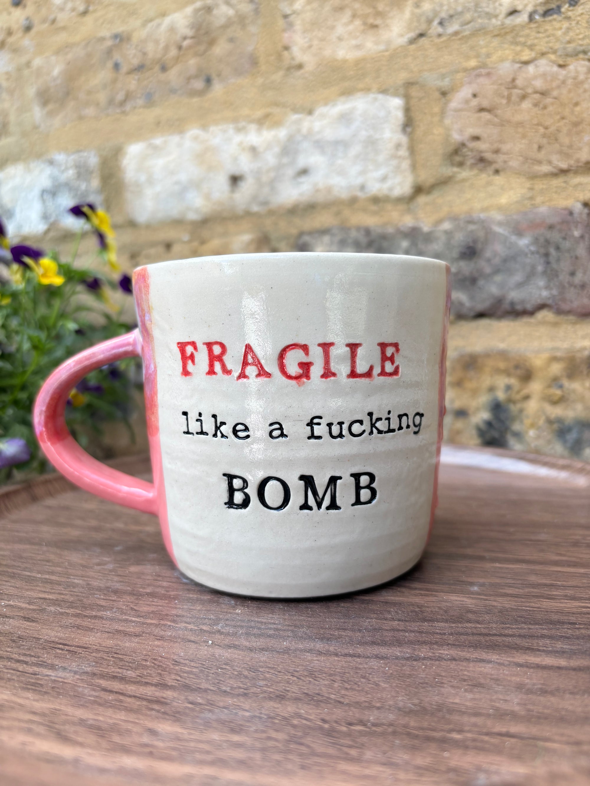 "FRAGILE like a fucking bomb" mug (pink wood, cream clay)