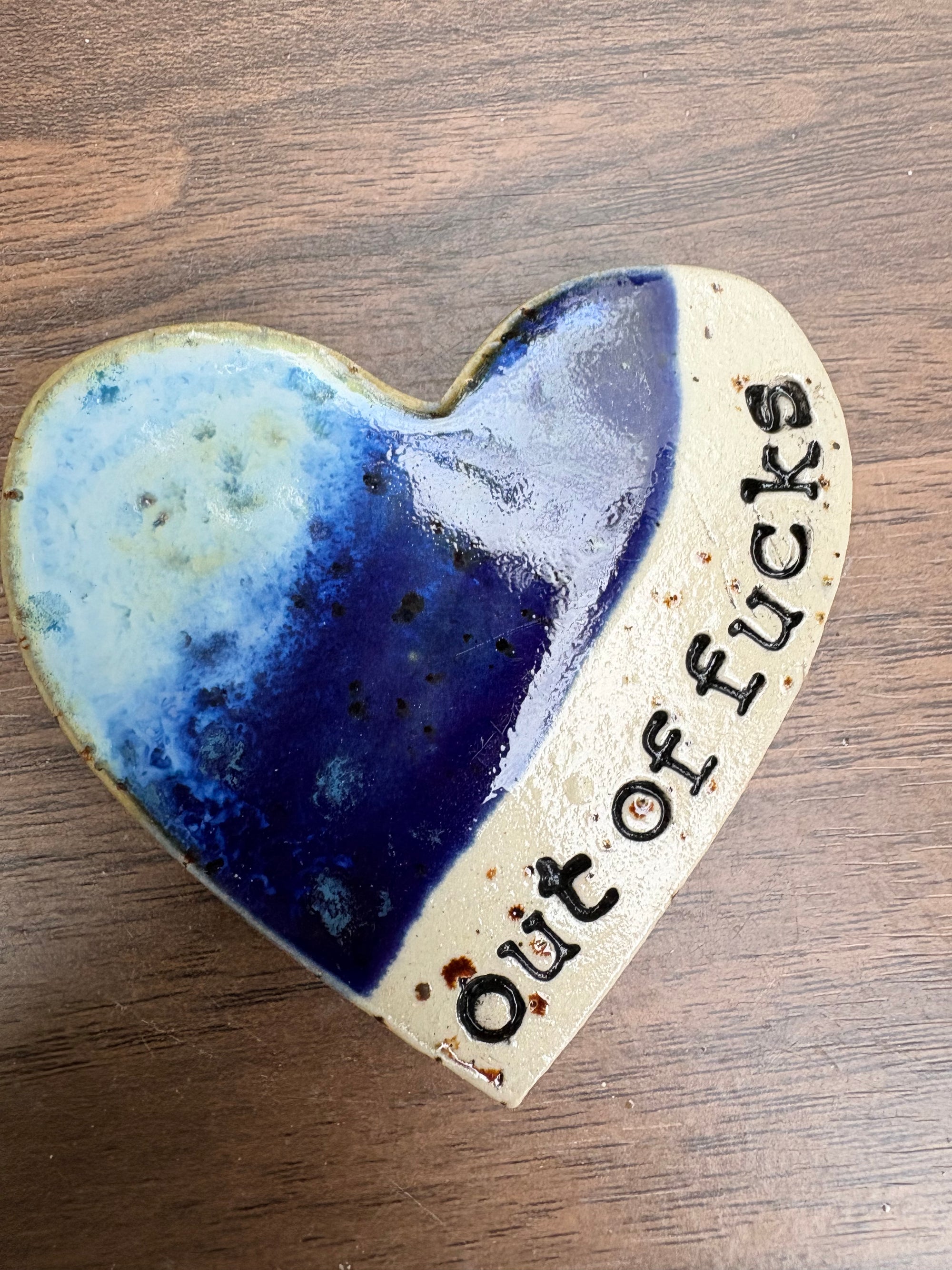 “out of fucks" magnet (sea shore, large)