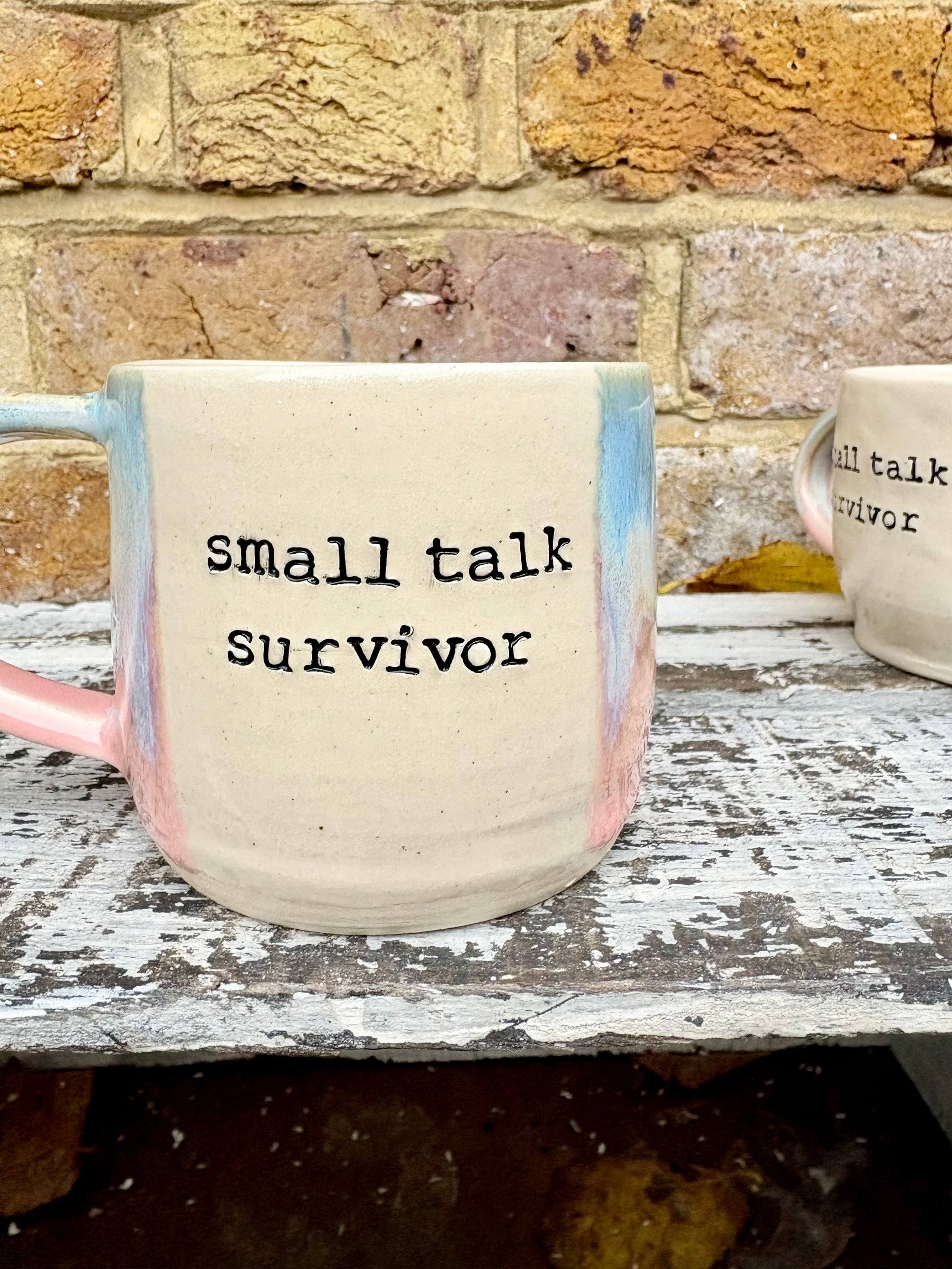 Small Talk Survivor mug (pinks and blue)