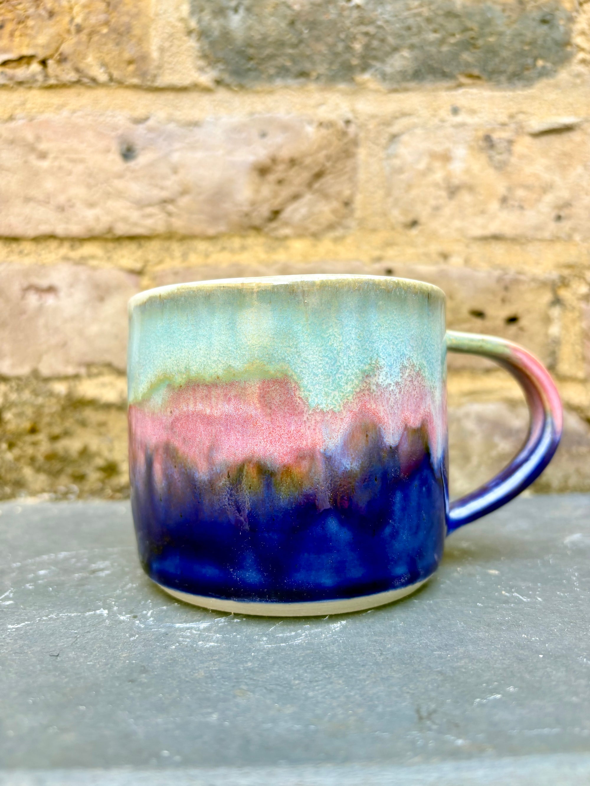 "really happy to be here” "what a bunch of cunts" mug (pink night sky)