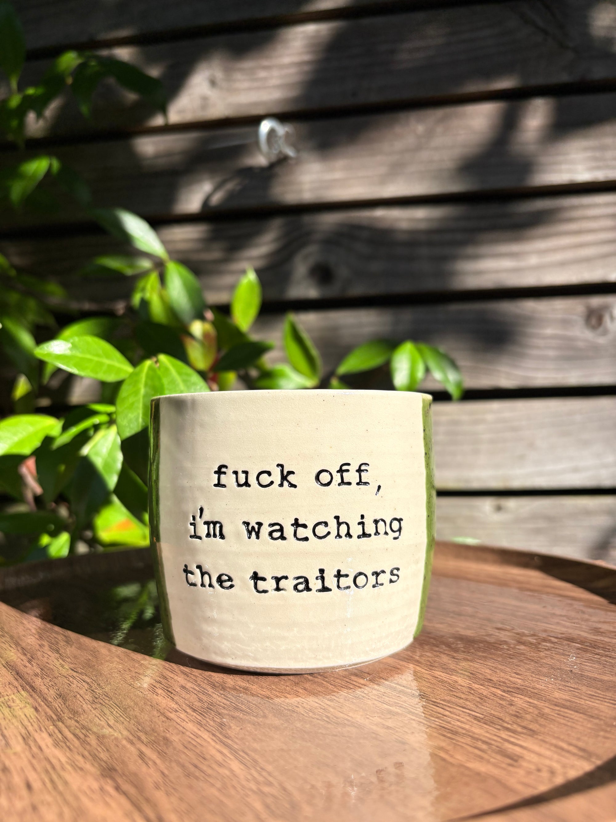 "fuck off, i'm watching the traitors" mug (no handle/green speckle, 300ml)