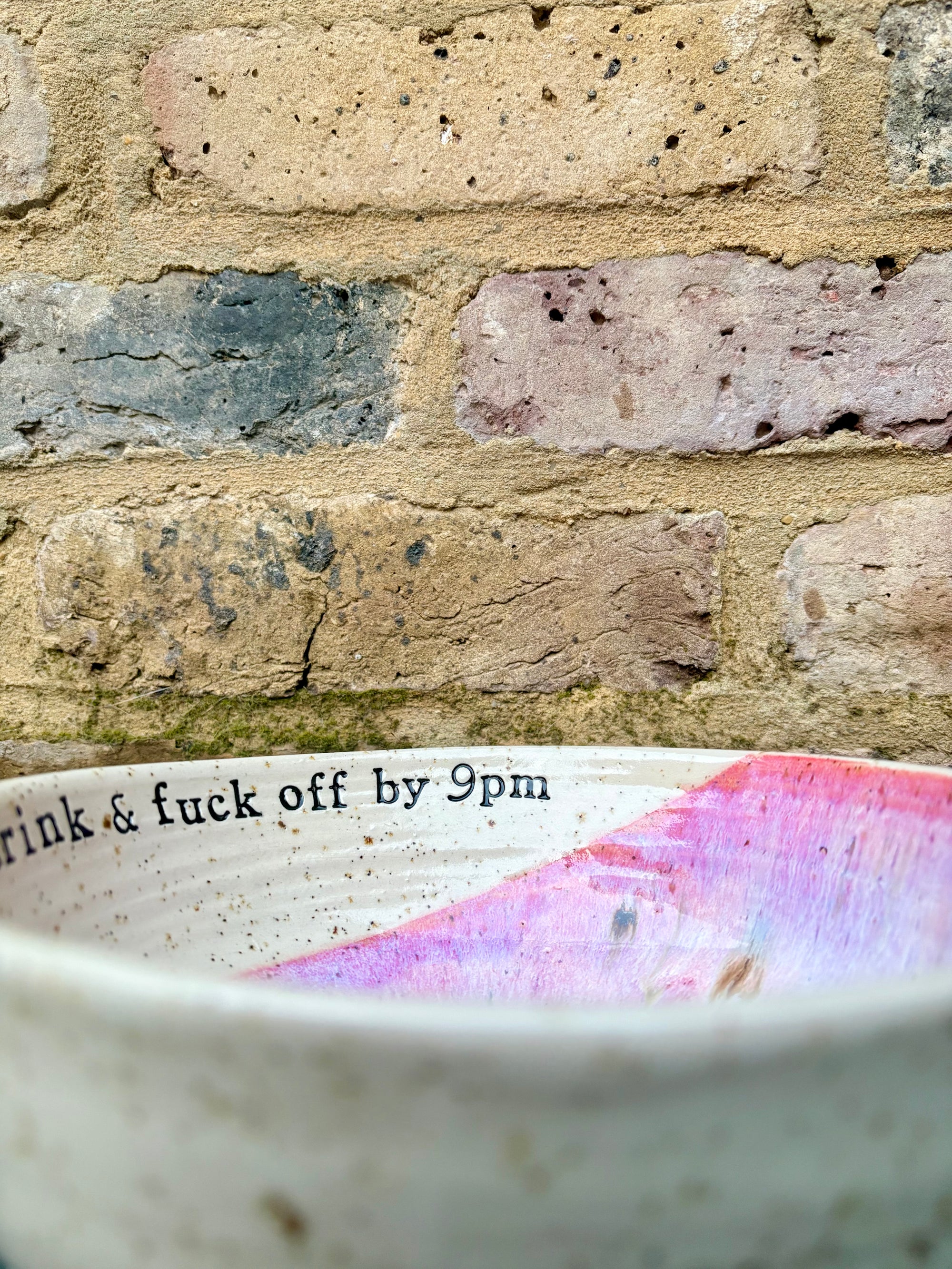 “eat, drink and fuck off by 9pm" round salad/pasta bowl (pink, flecked clay)