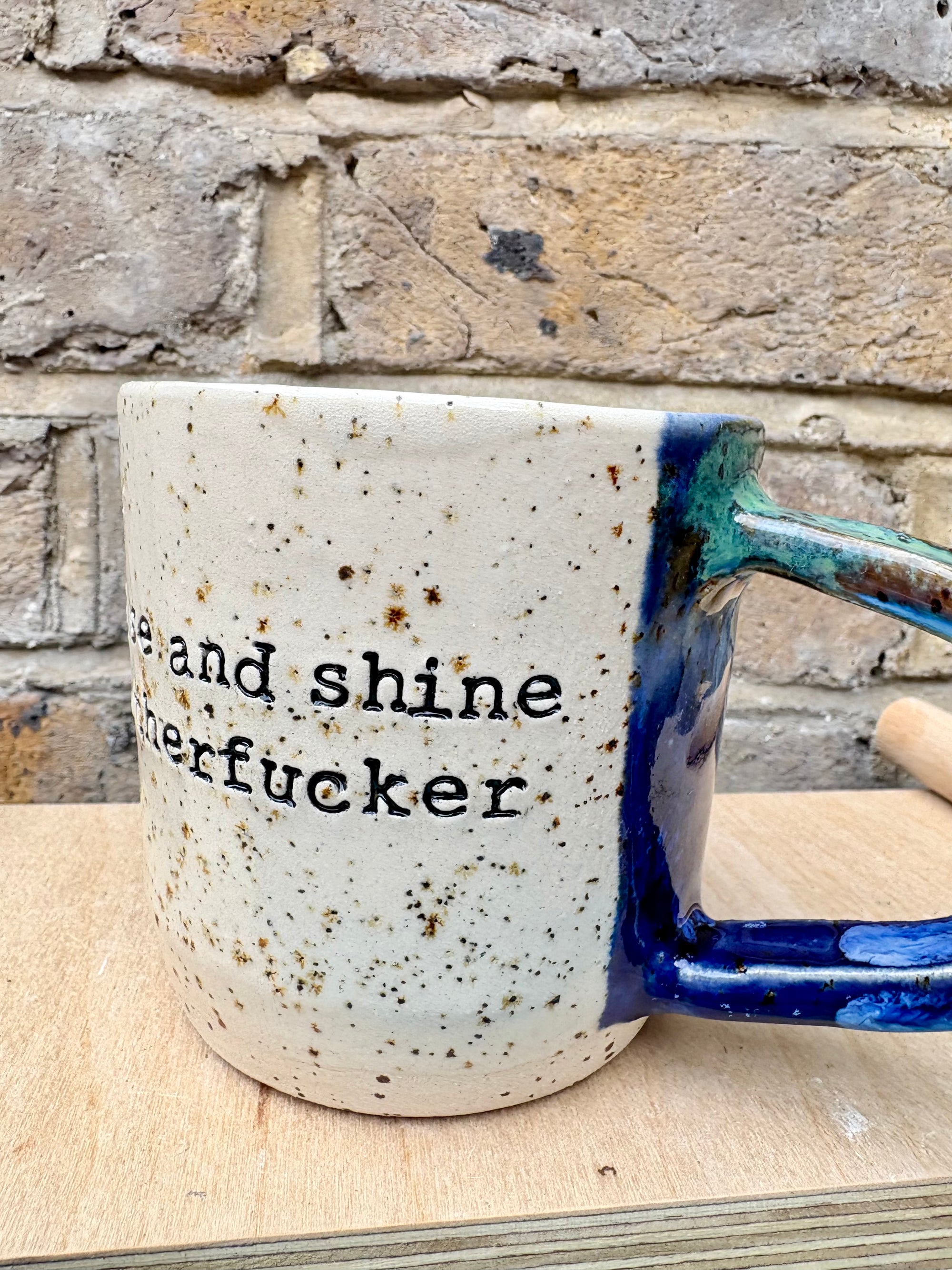 "rise and shine motherfucker" mug