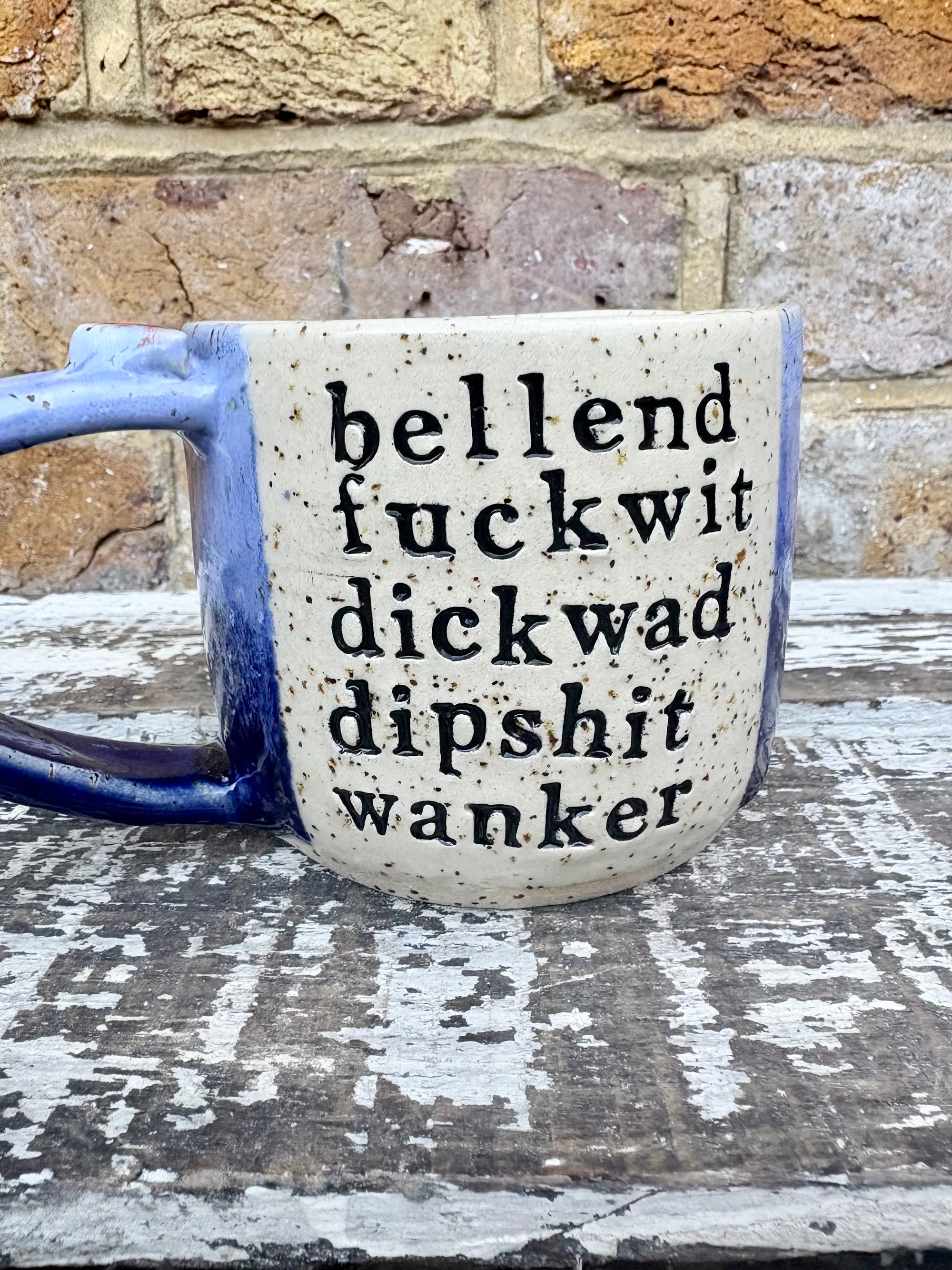 "bellend fuckwit dickwad dipshit wanker" mug (Blues)