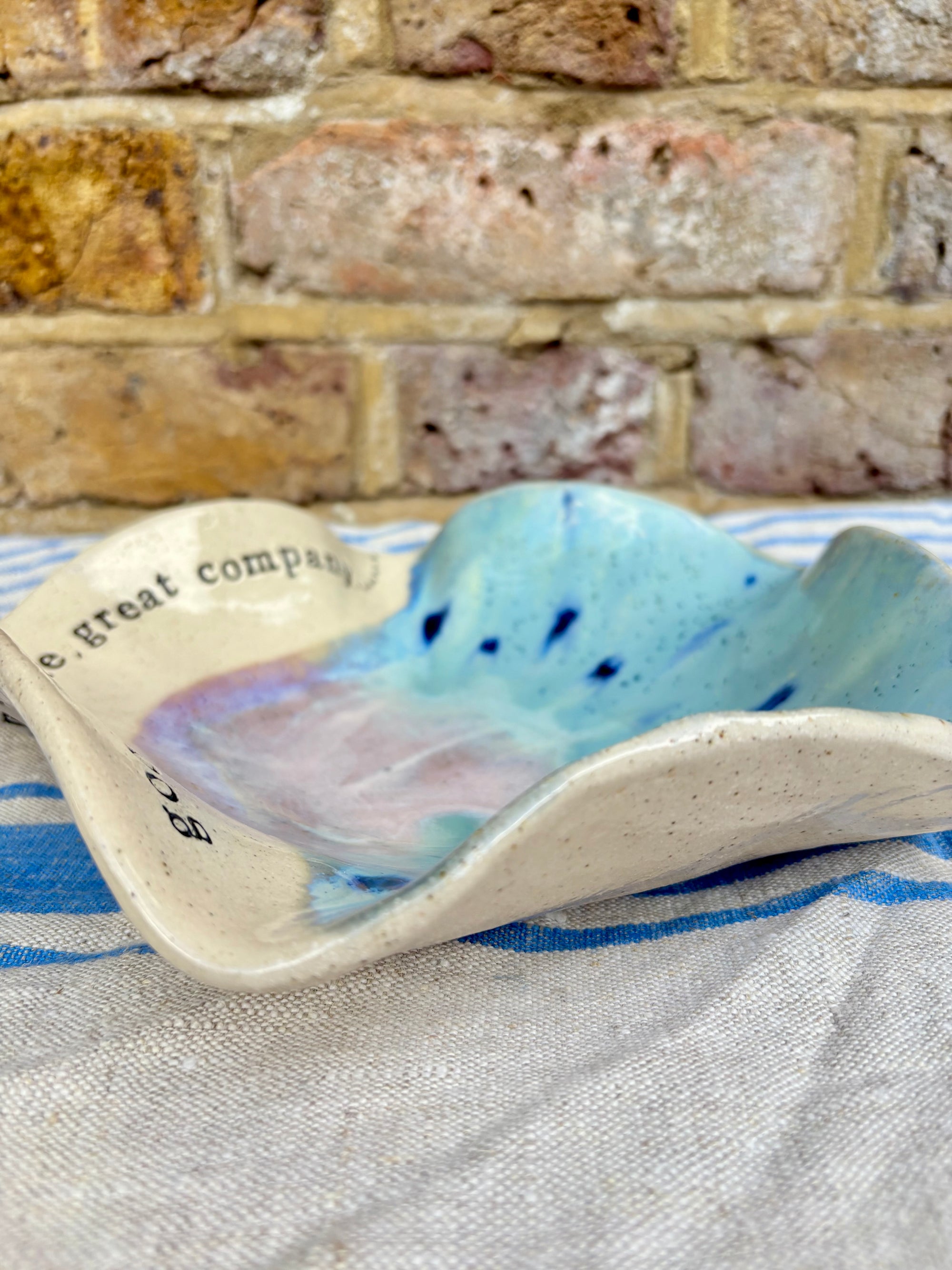 "good food, fine wine, great company..." serving dish