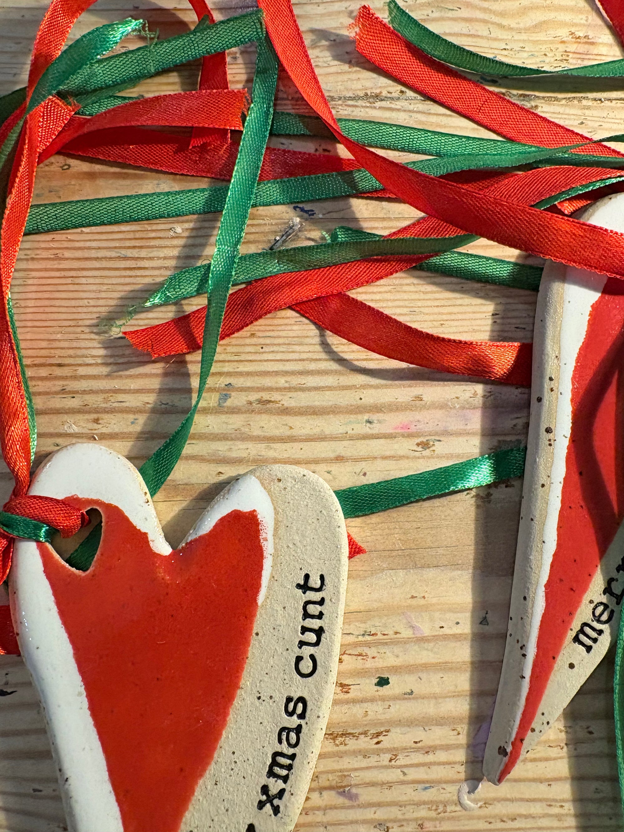 “merry xmas cunt” hanging decoration (red and white, large)