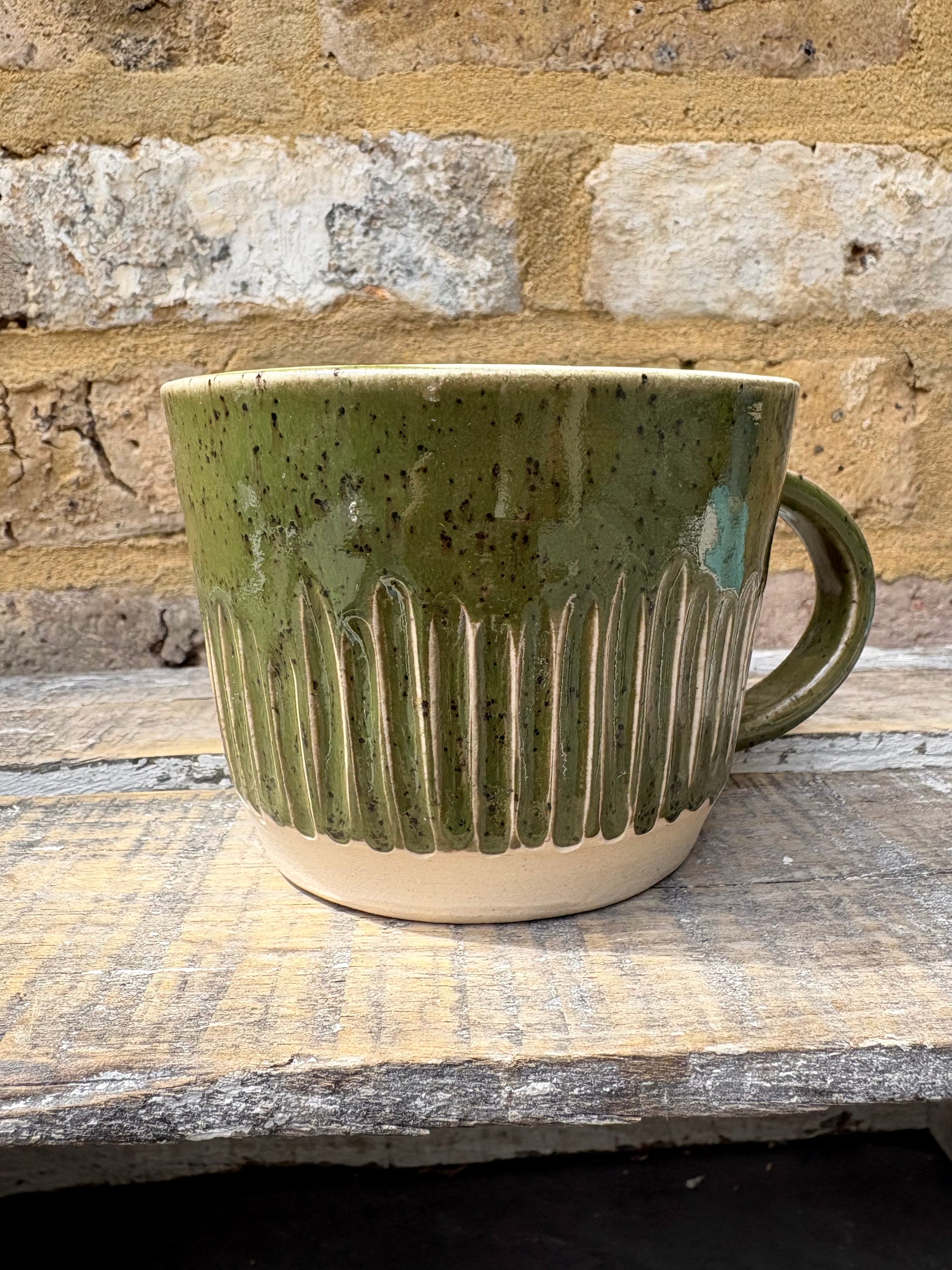 "menopausal and fresh out of fucks" mug (speckled green)