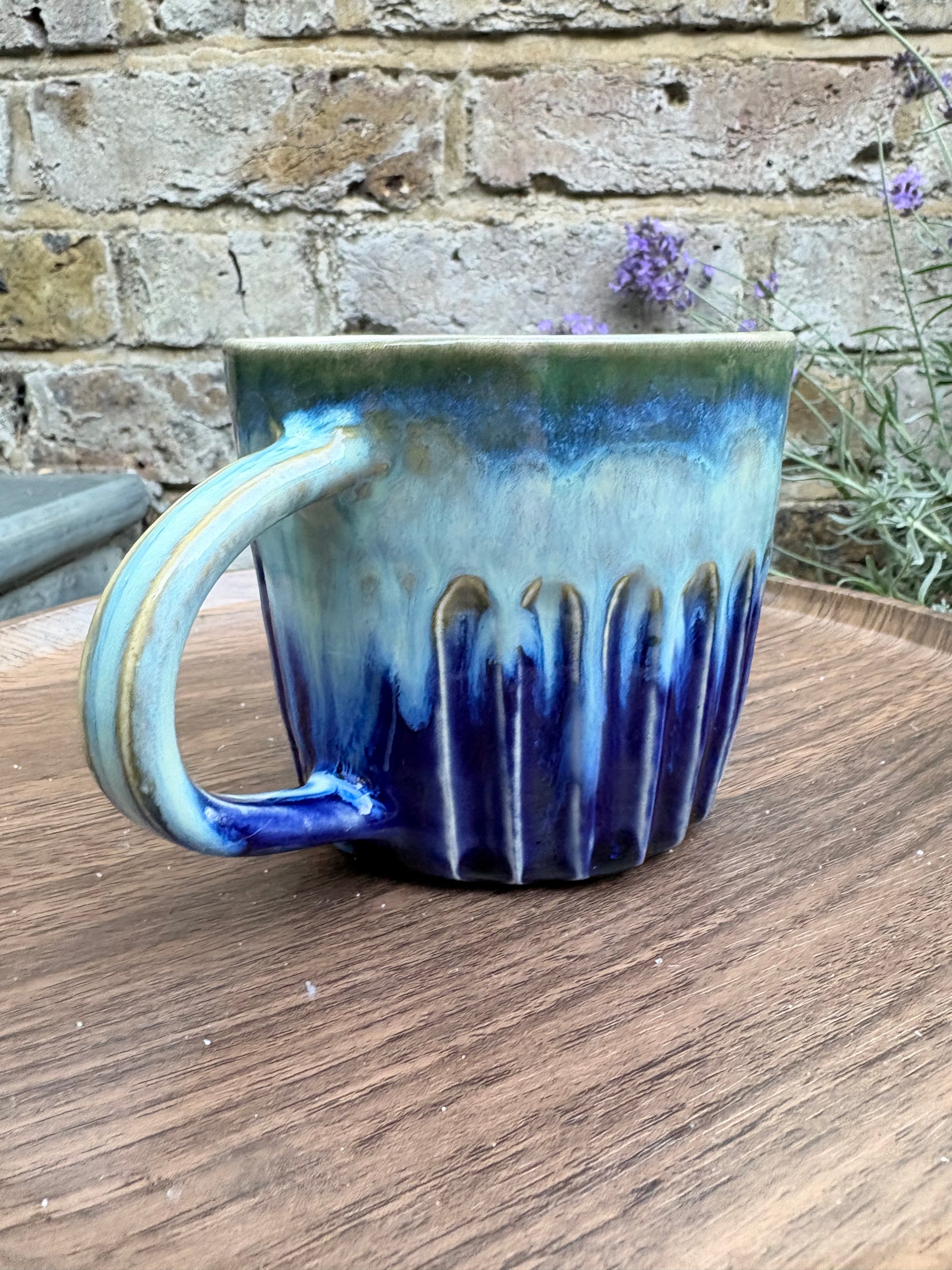“Fuck off I’m reading" mug (blue/greens)