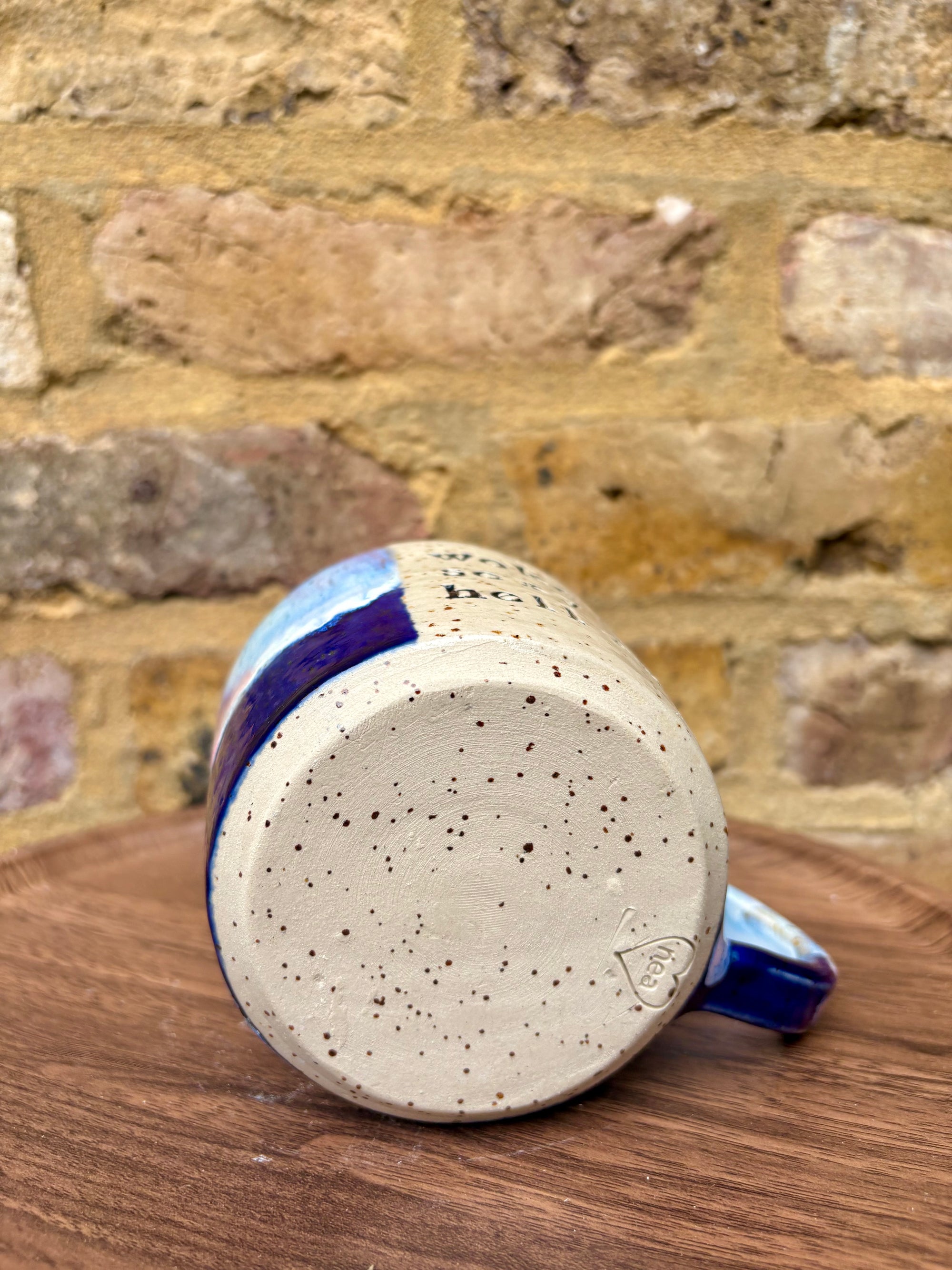 “woke up sexy as hell again” mug (flecked, pink night sky)