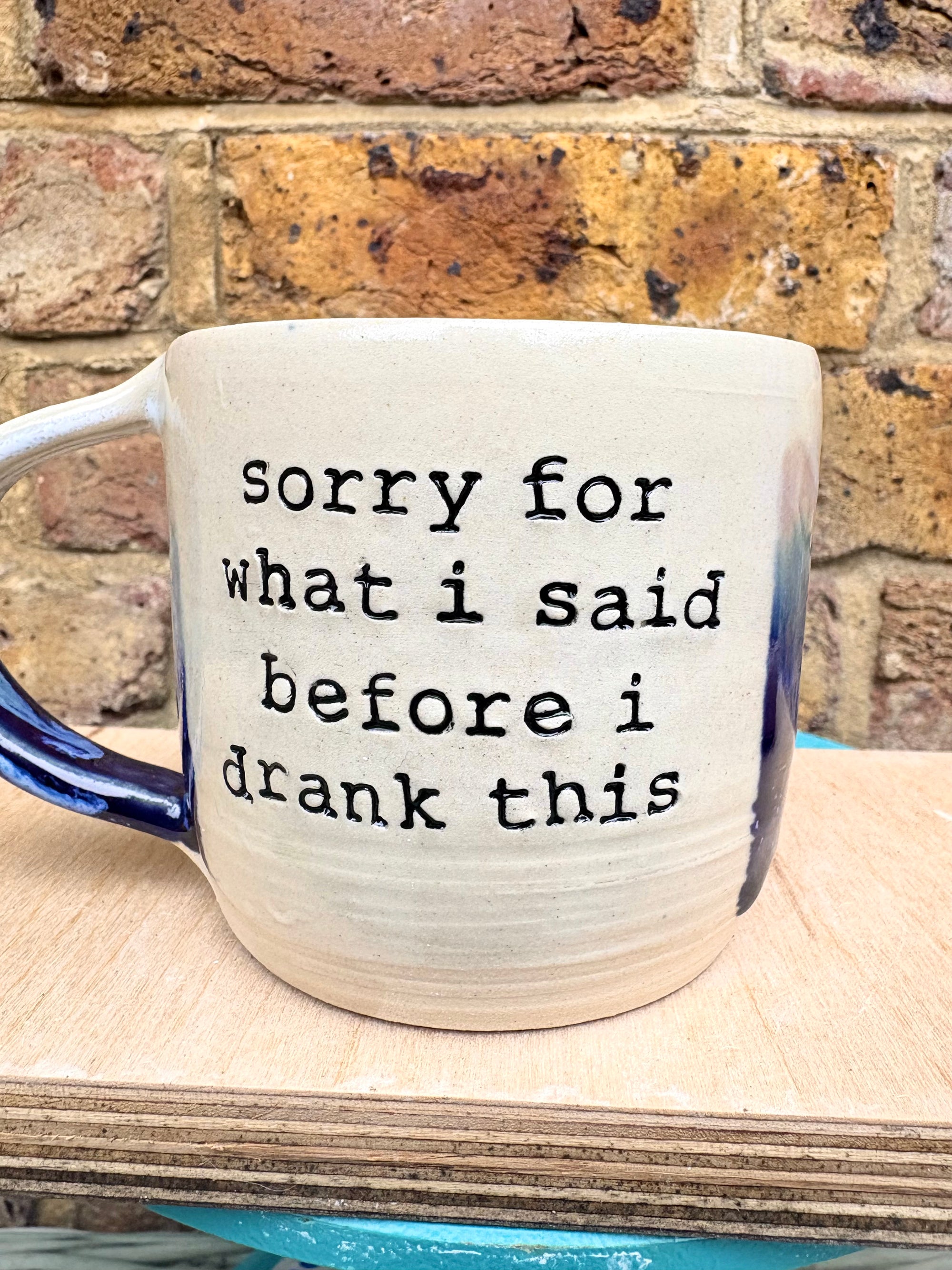 “sorry for what i said before I drank this” mug (blue night sky)