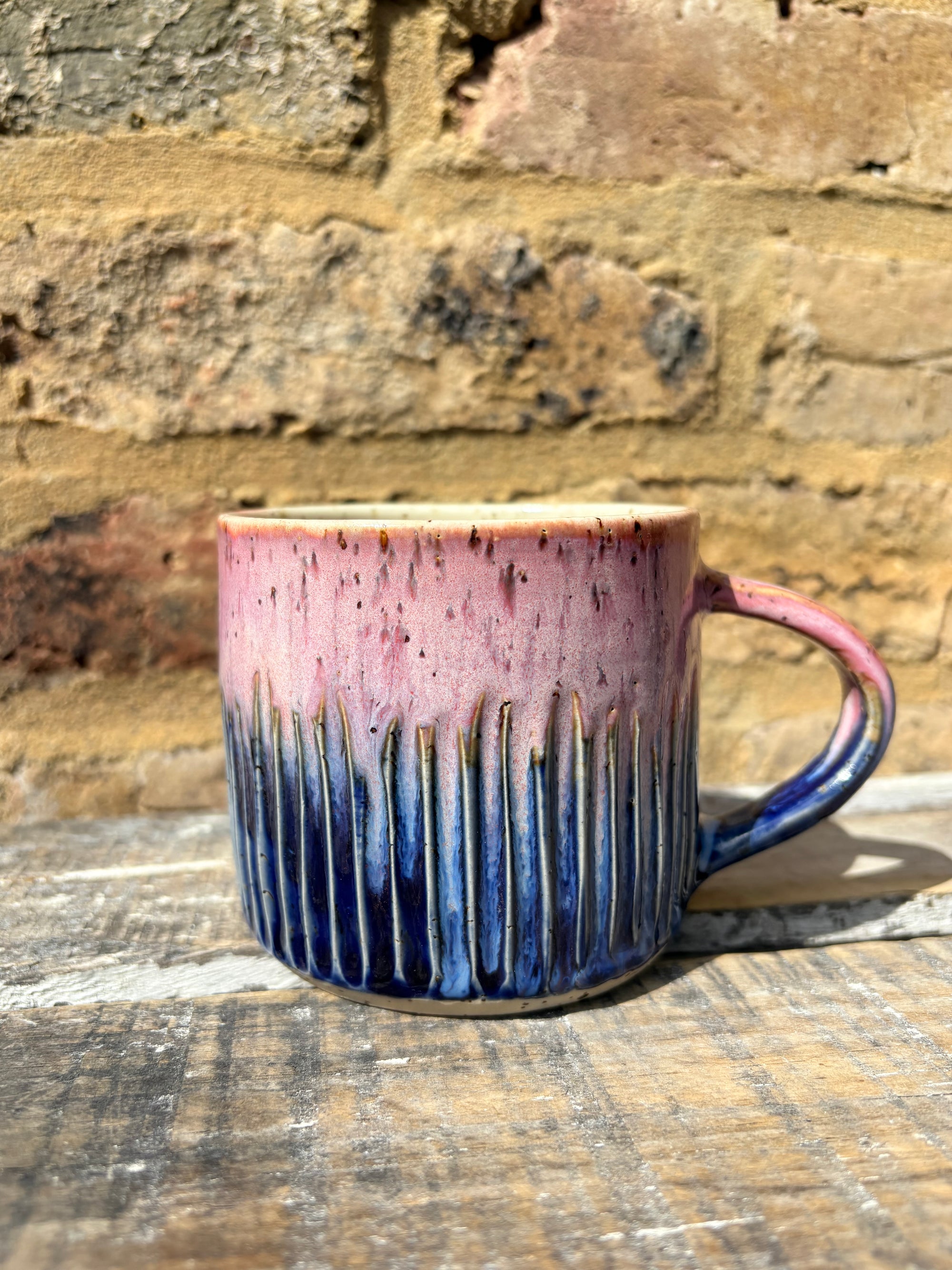 ""there's no "h" in "aitch" except that one" mug (pink/blue)
