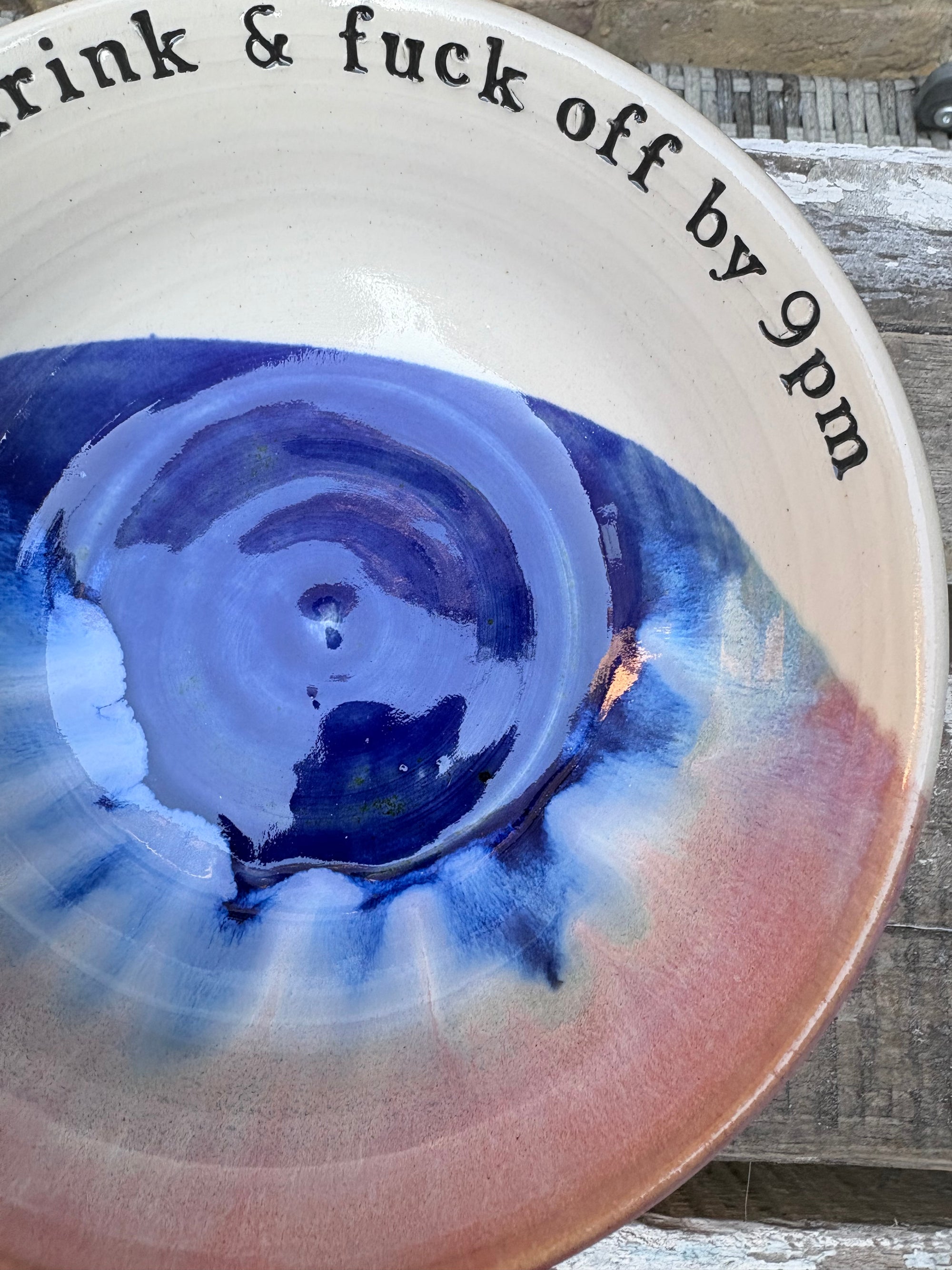 “eat, drink and fuck off by 9pm"  deep round salad/pasta bowl (pink night sky)