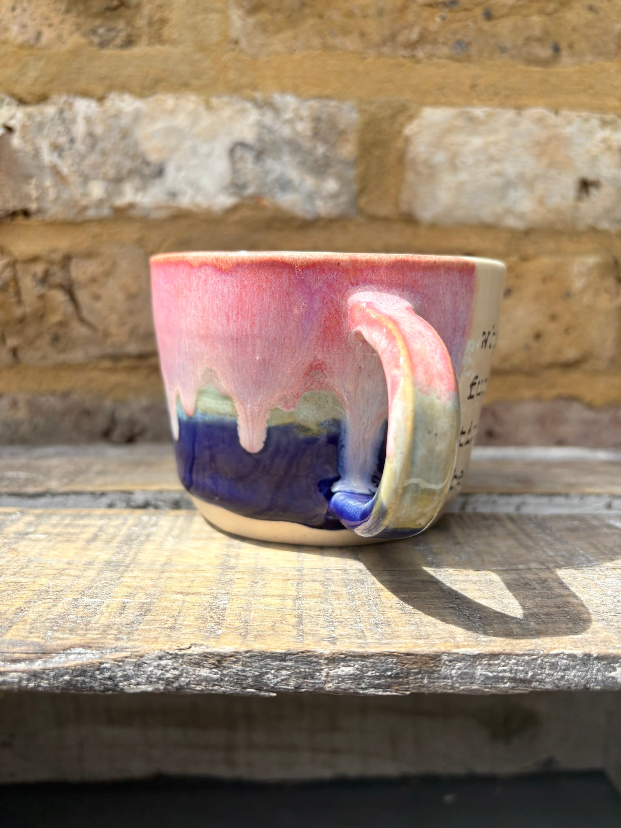 “what a fucked up time to be alive" mug (pink night sky)