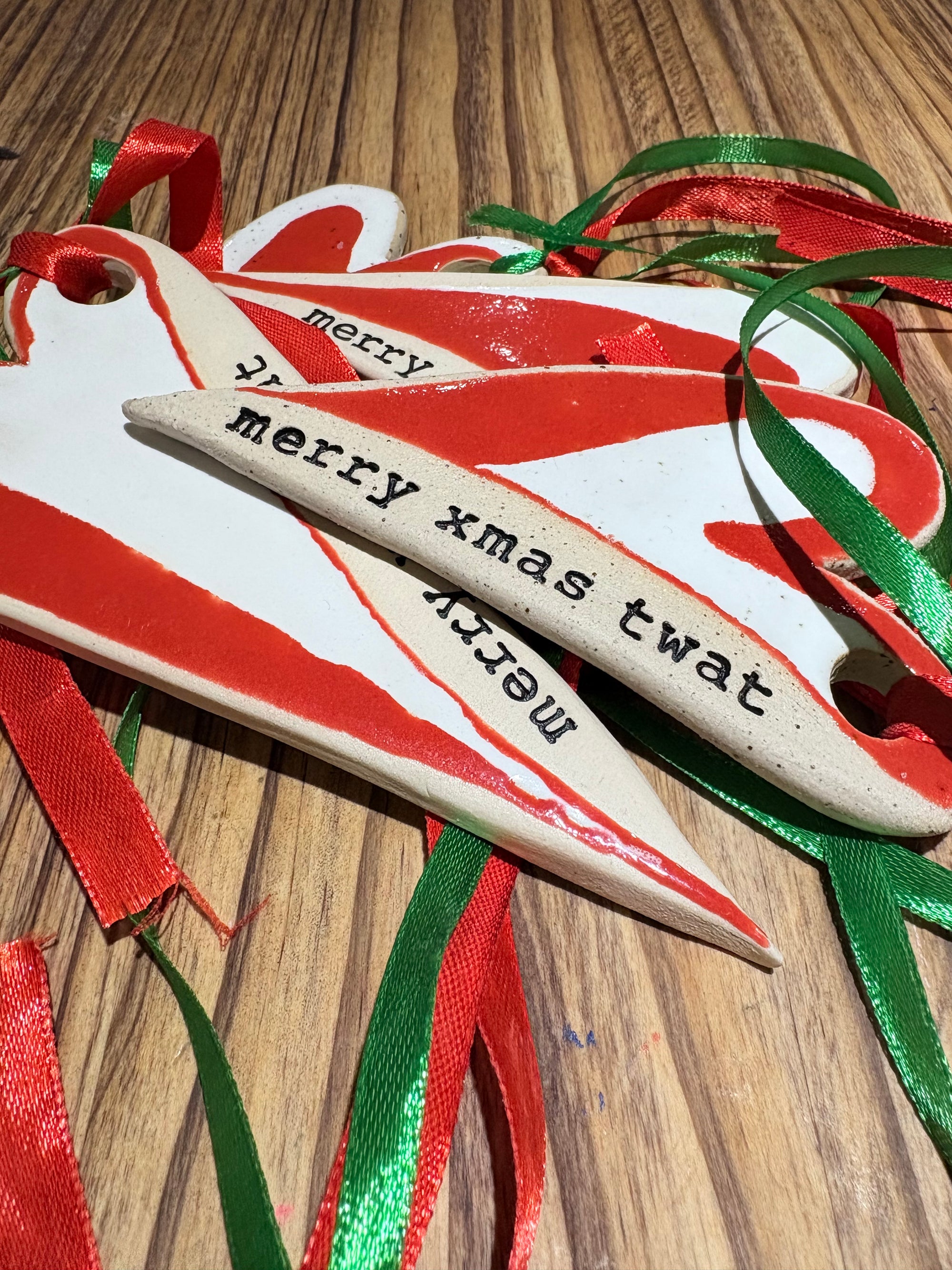 “merry xmas twat” hanging decoration (red and white, large)