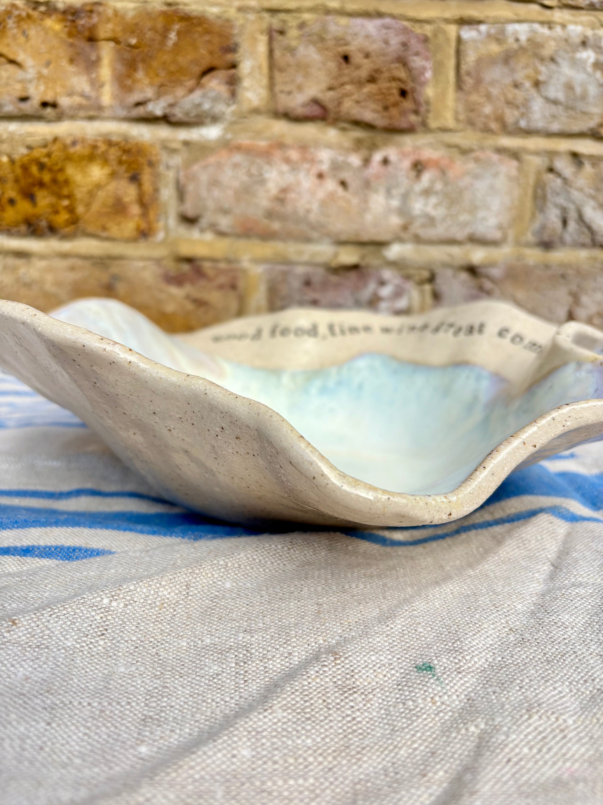 "good food, fine wine, great company..." serving dish