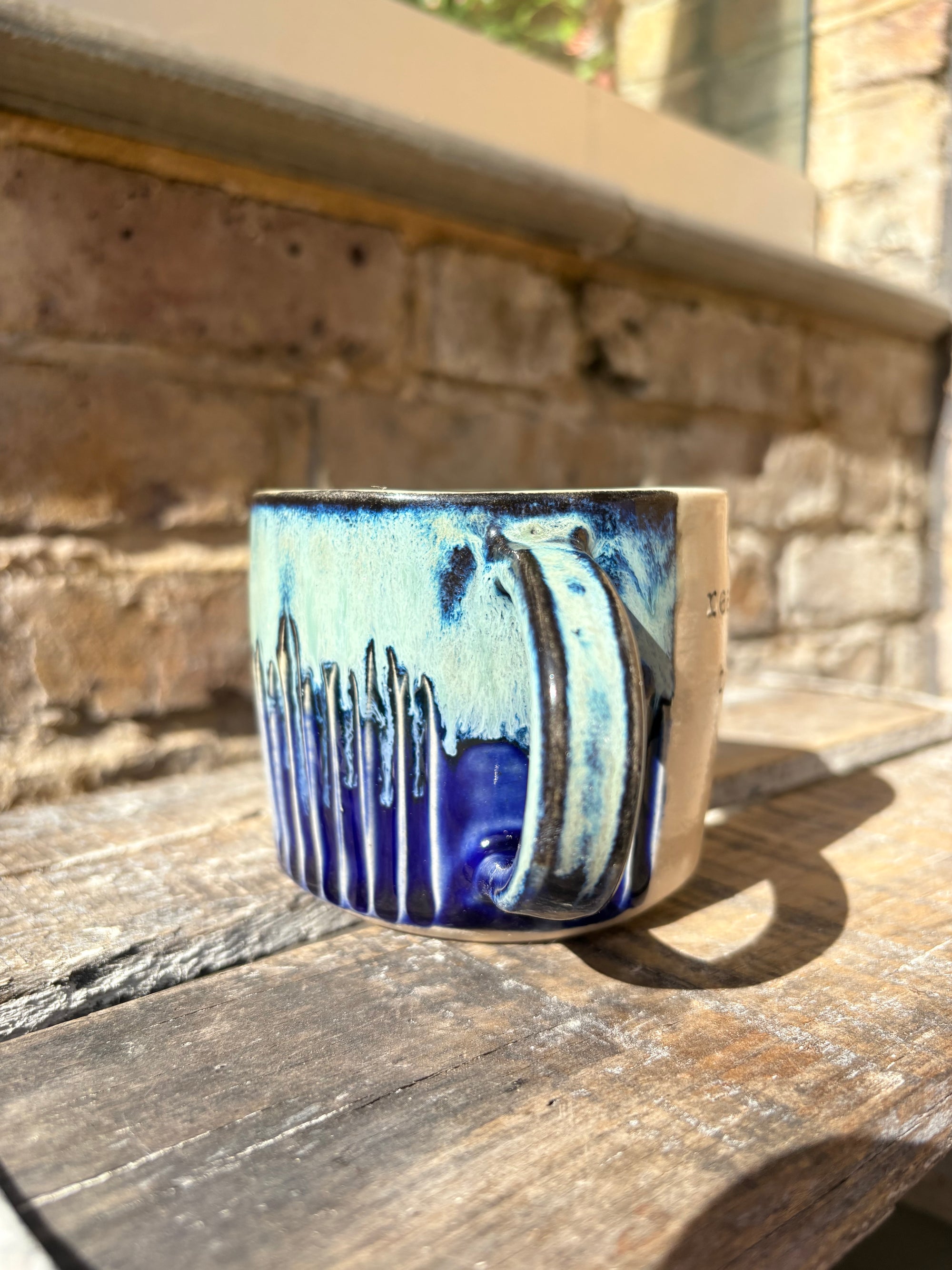 "really happy to be here” "what a bunch of cunts" mug (medium, blue shore)