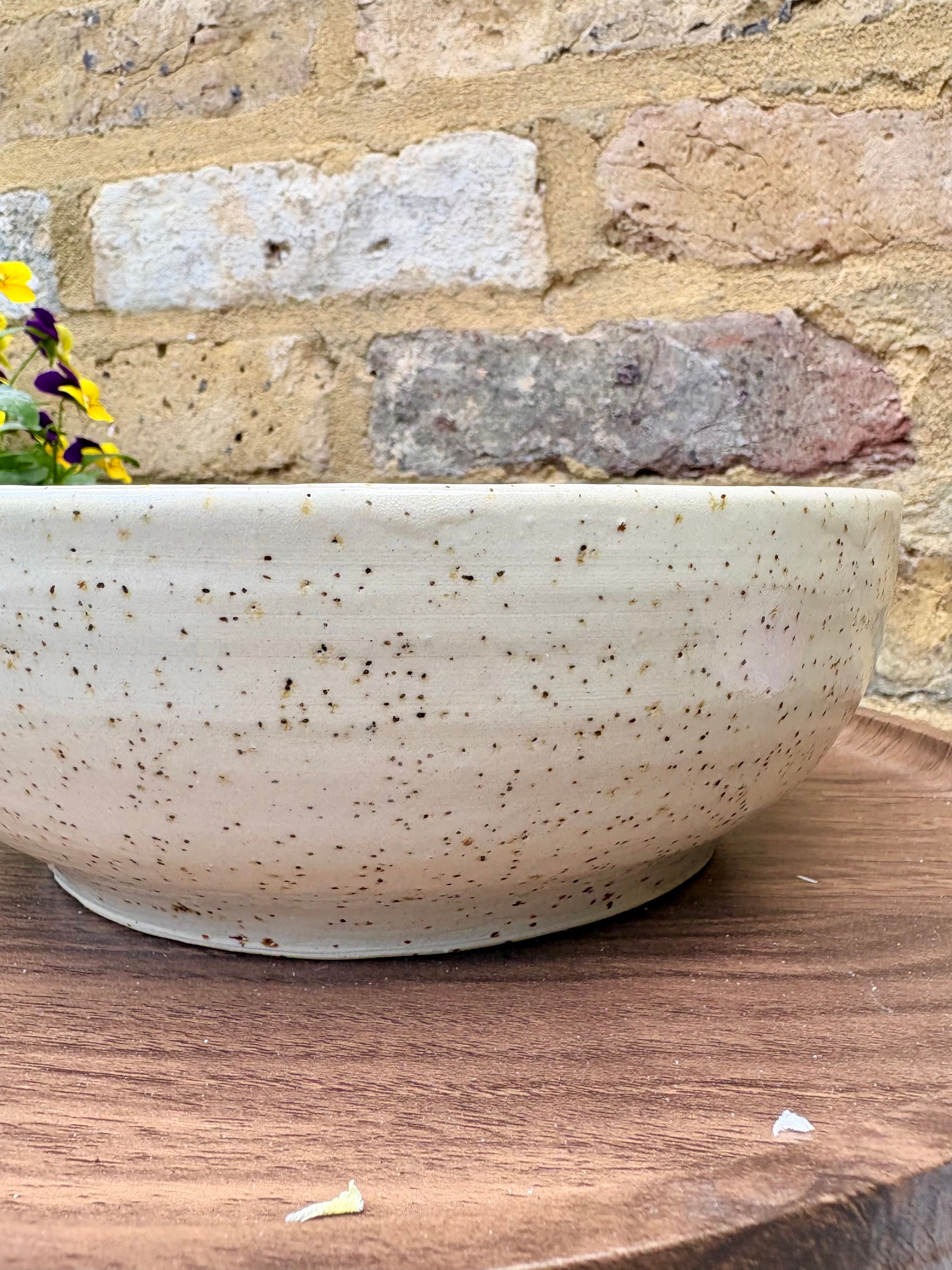 “eat, drink and fuck off by 9pm"  deep round salad/pasta bowl (pink, flecked clay)