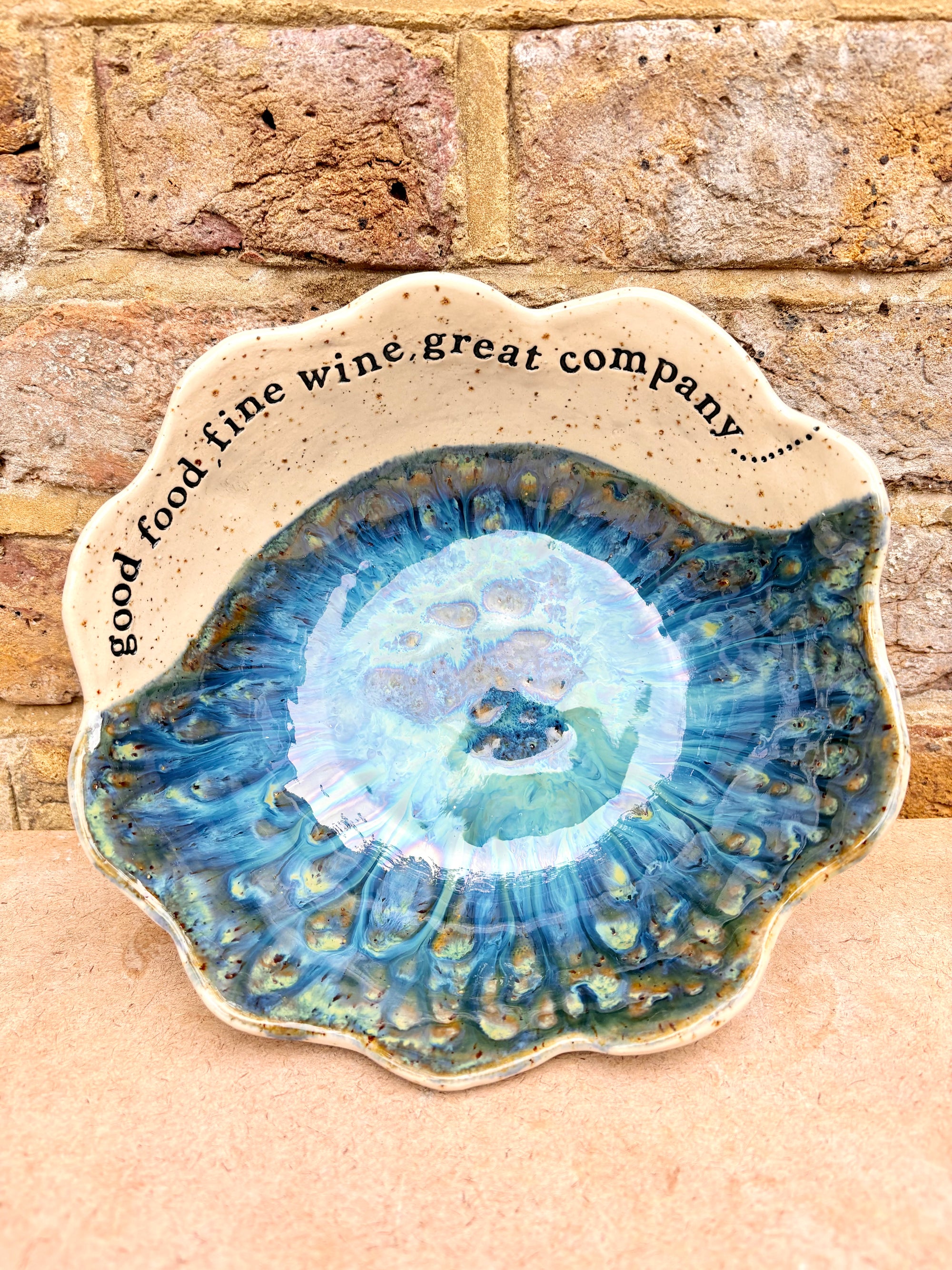 "good food, fine wine, great company..." deep salad/serving dish