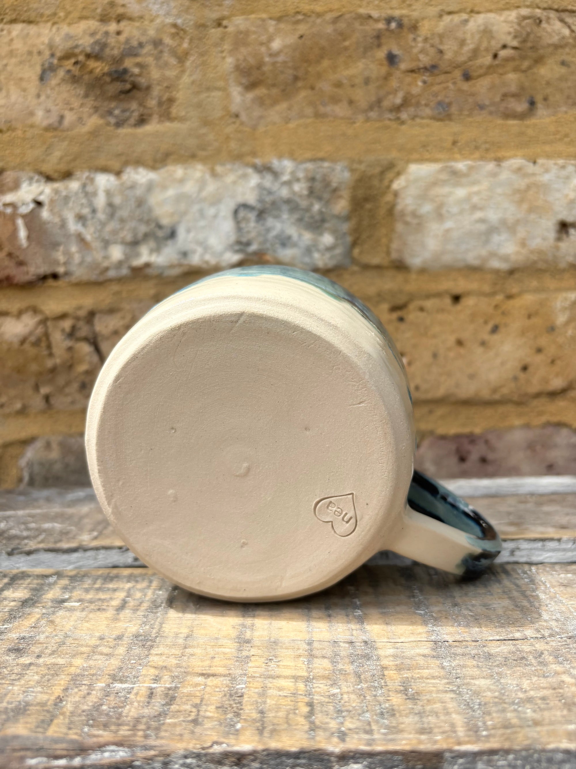 "menopausal and fresh out of fucks" mug (blue shore)