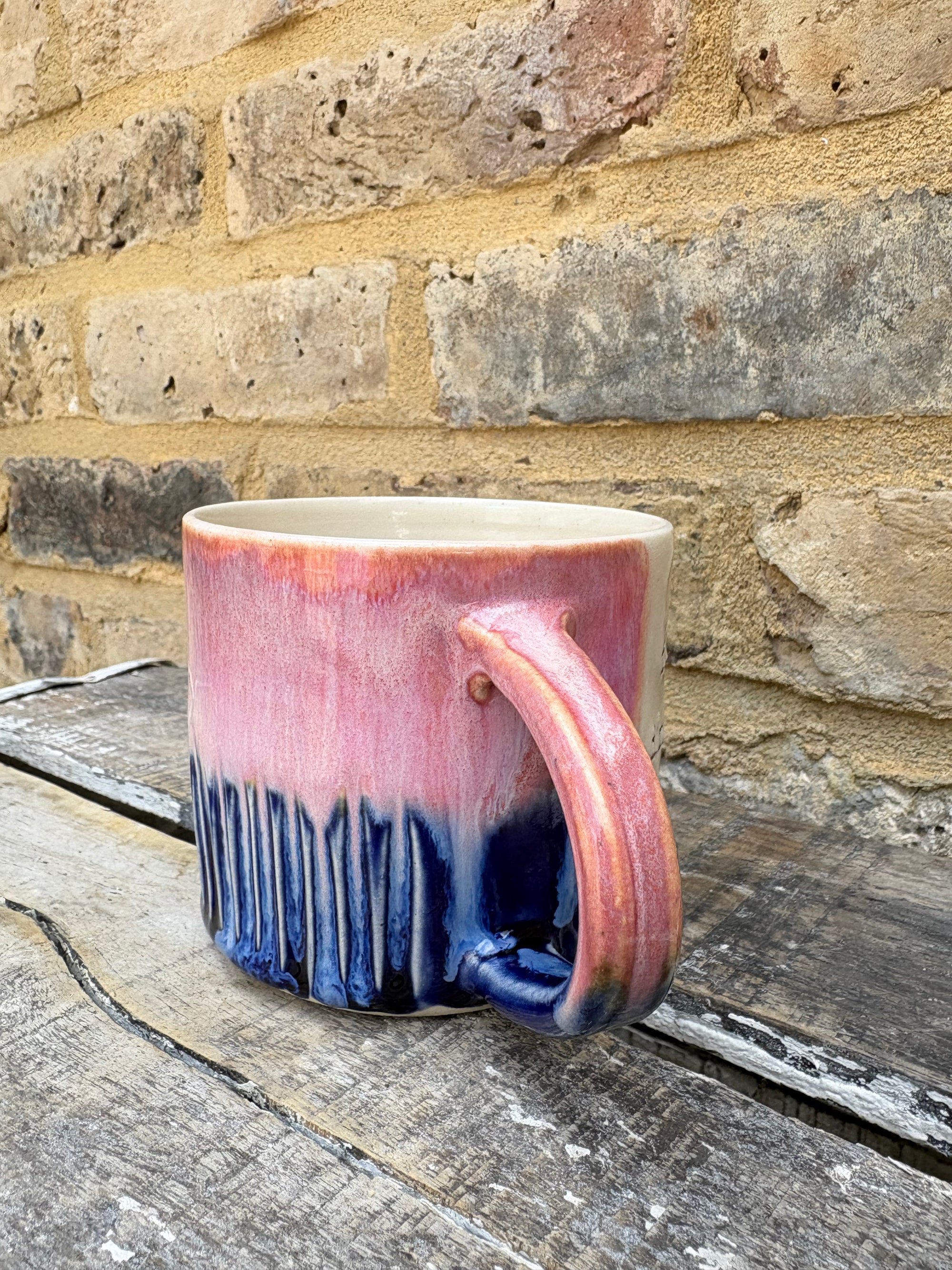 Two “fuck off i’m reading” mugs